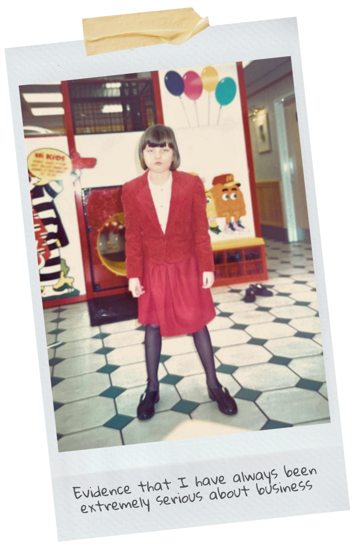A young girl dressed in a red skirt and blazer, standing in a colorful indoor space with balloons, cartoon characters, and shoes on the floor. The bottom caption reads, 'Evidence that I have always been extremely serious about business.'