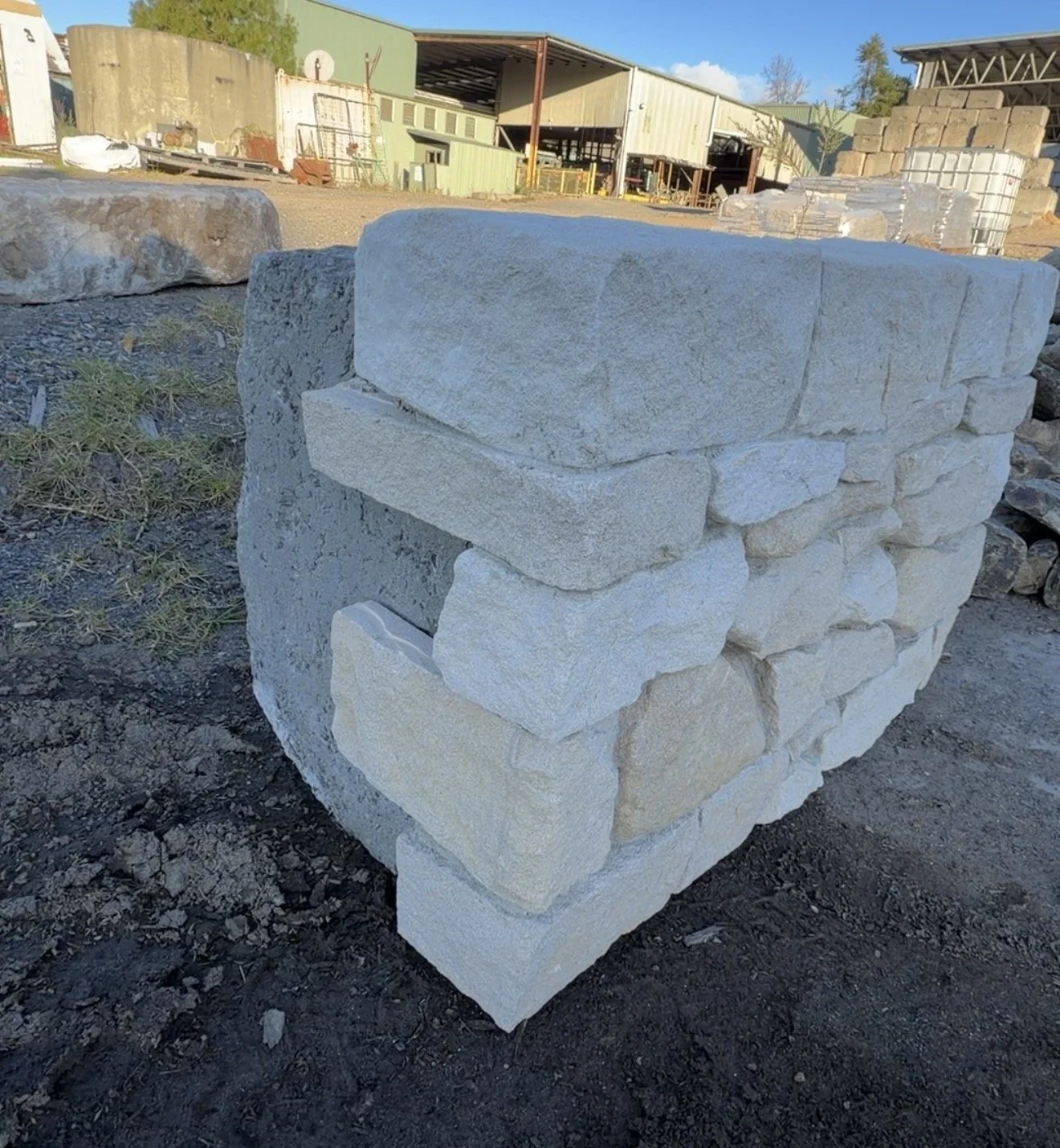 Freeform Southern Highlands sandstone walling with irregular natural pieces and warm Australian sandstone tones.