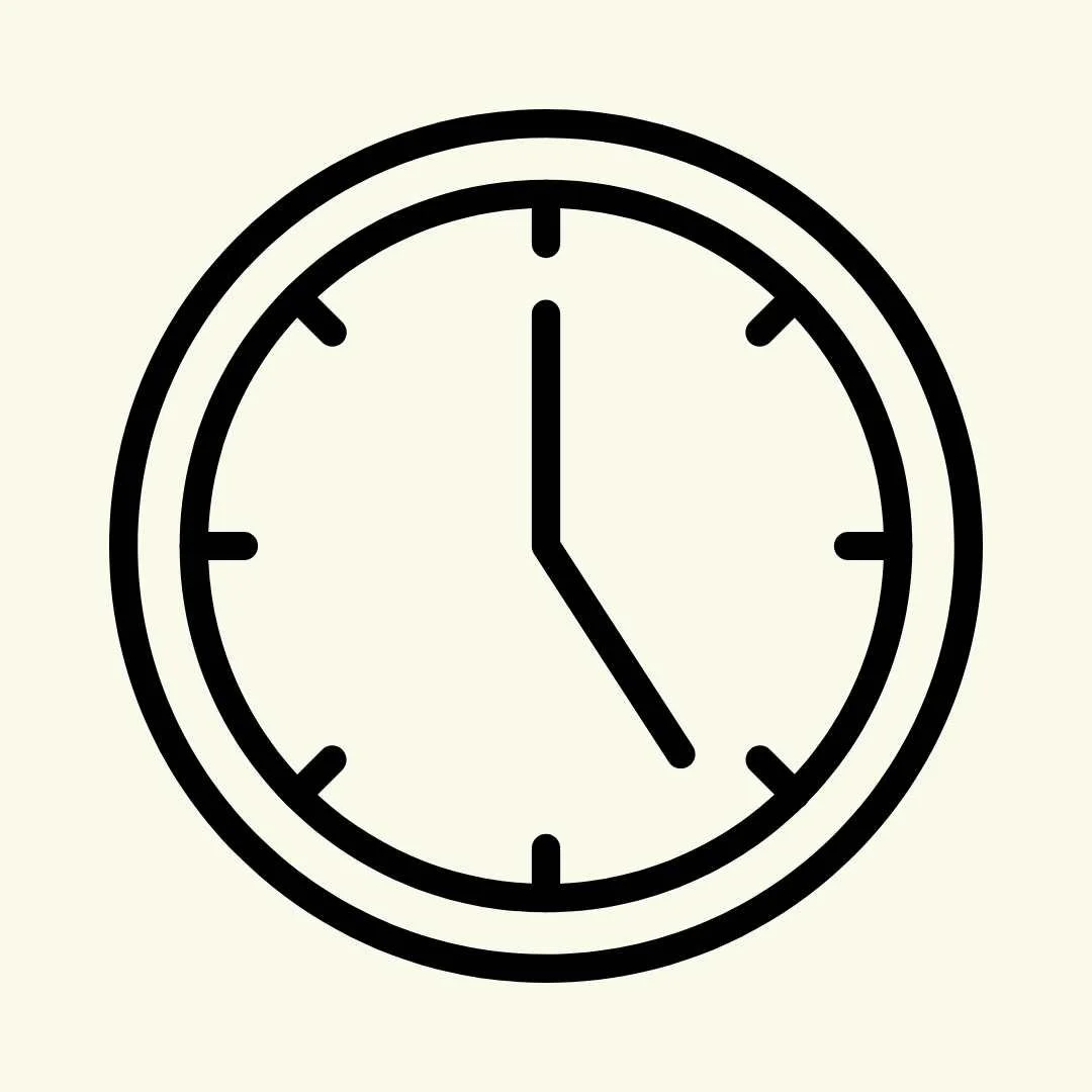 Simple black and white clock face showing 12:20.