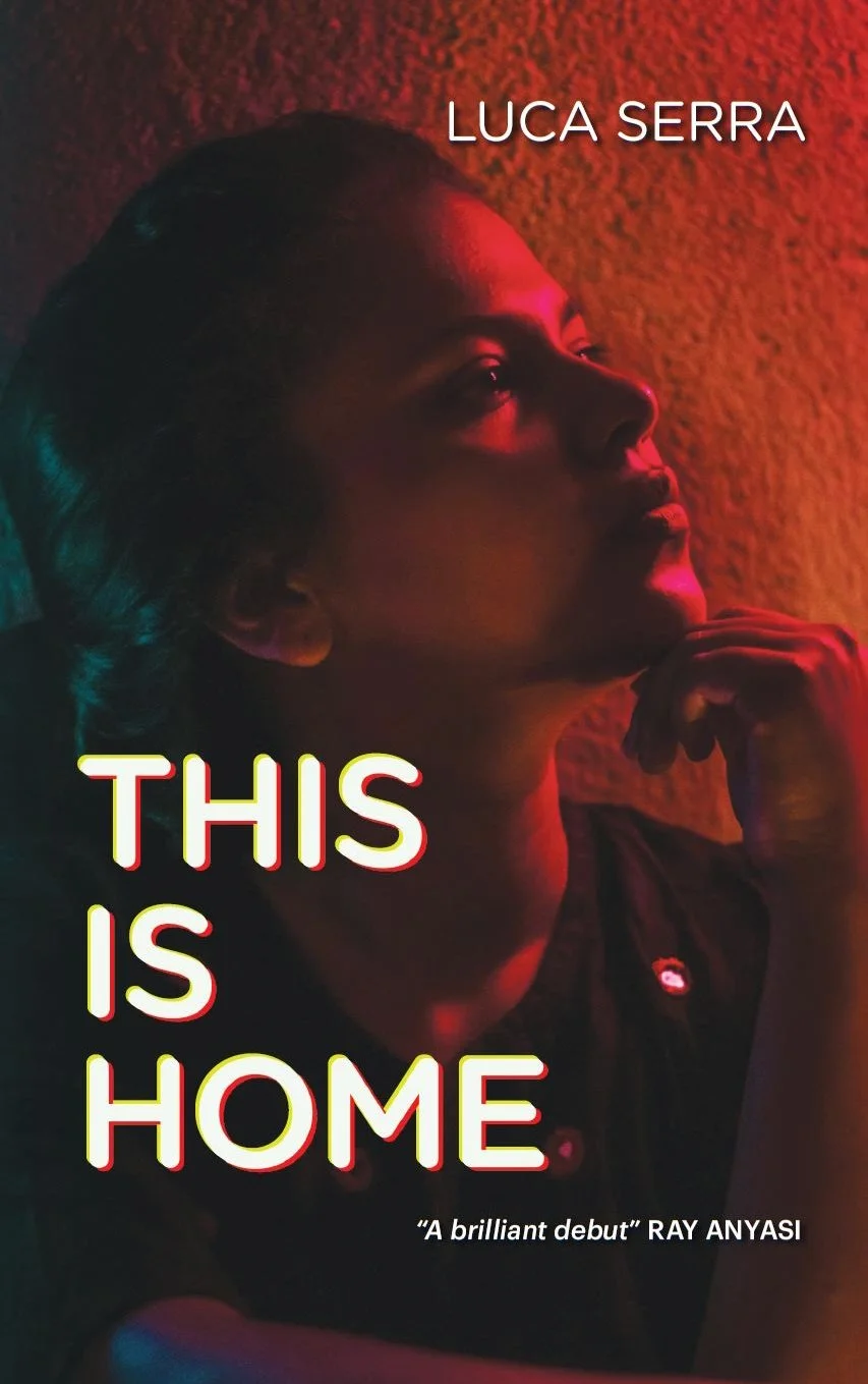 Book cover titled 'This is Home' by Luca Serra, featuring a profile of a woman with her hand near her chin, bathed in red and teal lighting.