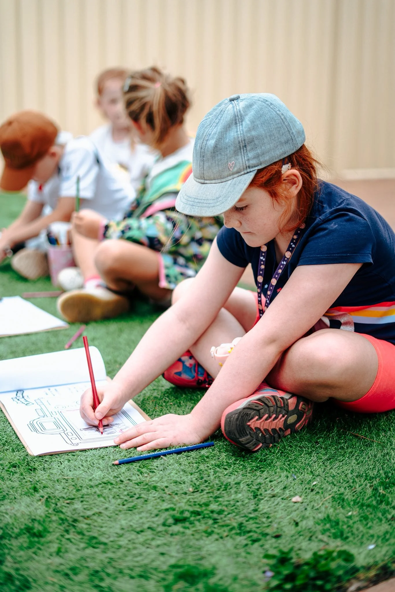 Young girl completes a photography worksheet