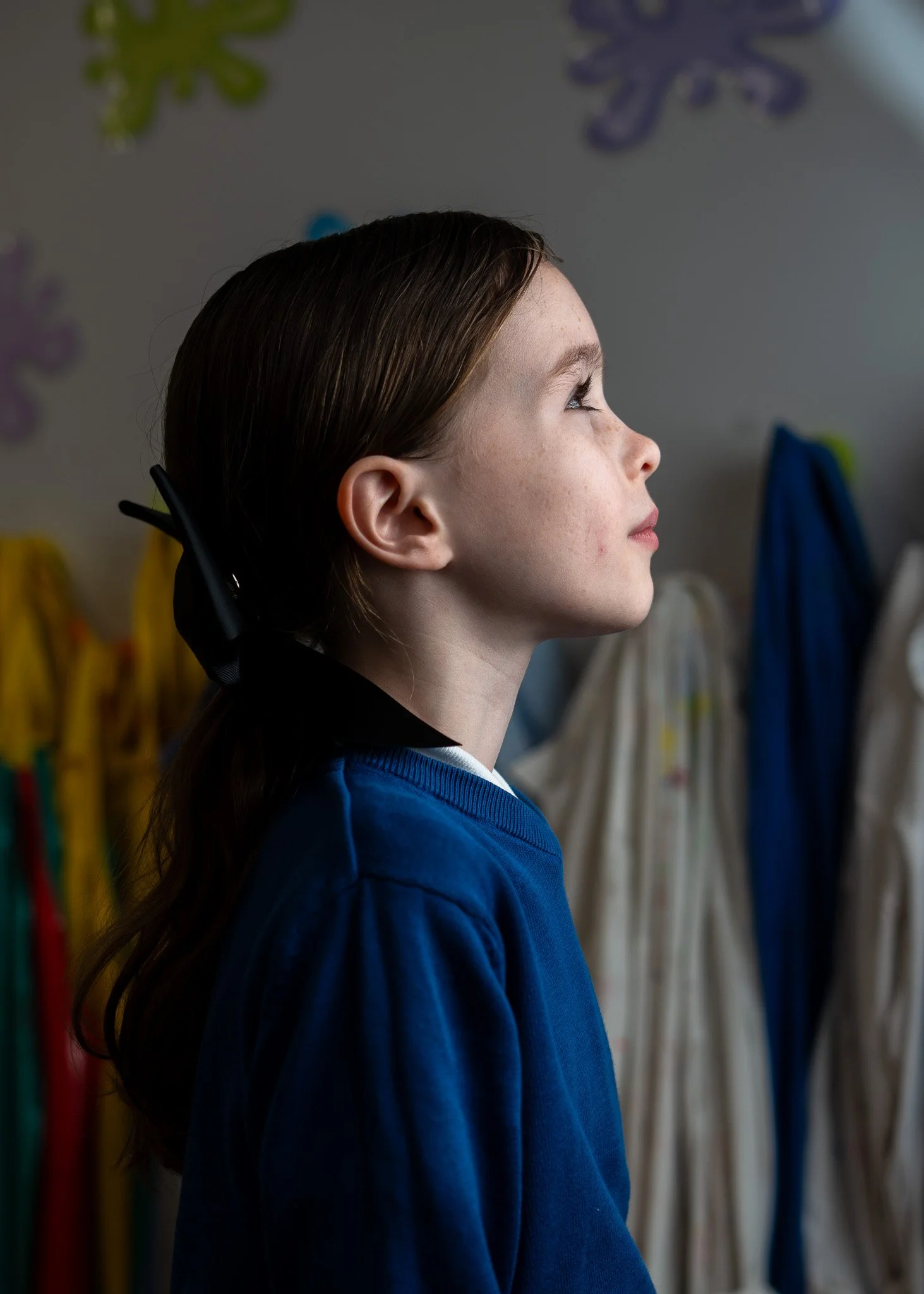 Portrait of child experimenting with photography lighting