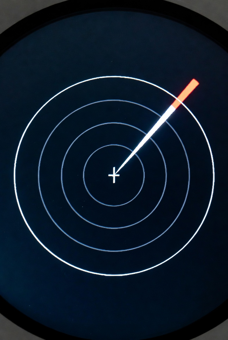 Radar screen showing a target at the perimeter.