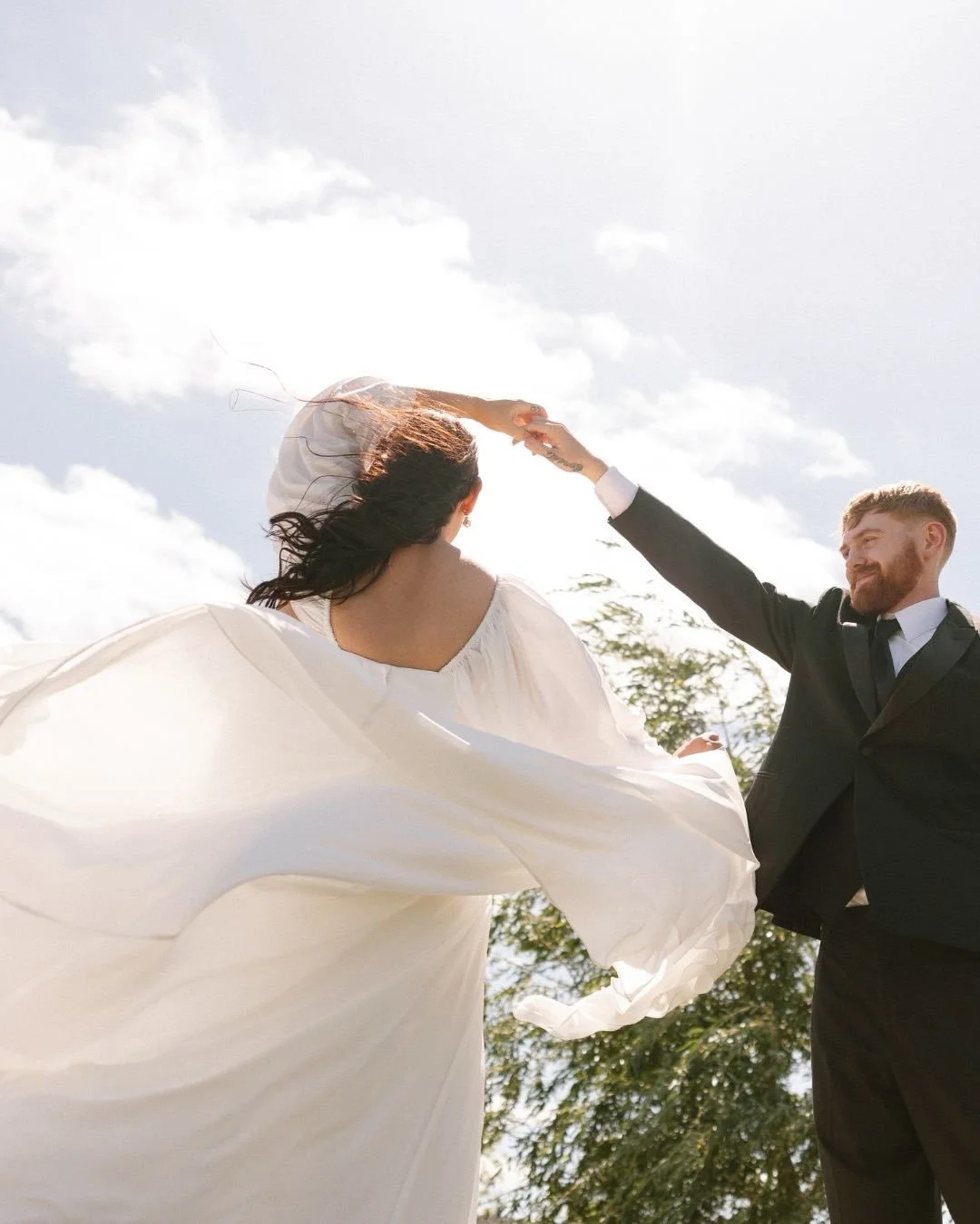 They had the kind of wedding day energy you hope every couple gets to feel. Calm, happy, fully in it, and having way too much fun with each other.

Just two people who could not stop smiling, spinning around in the sunshine, and soaking up every seco