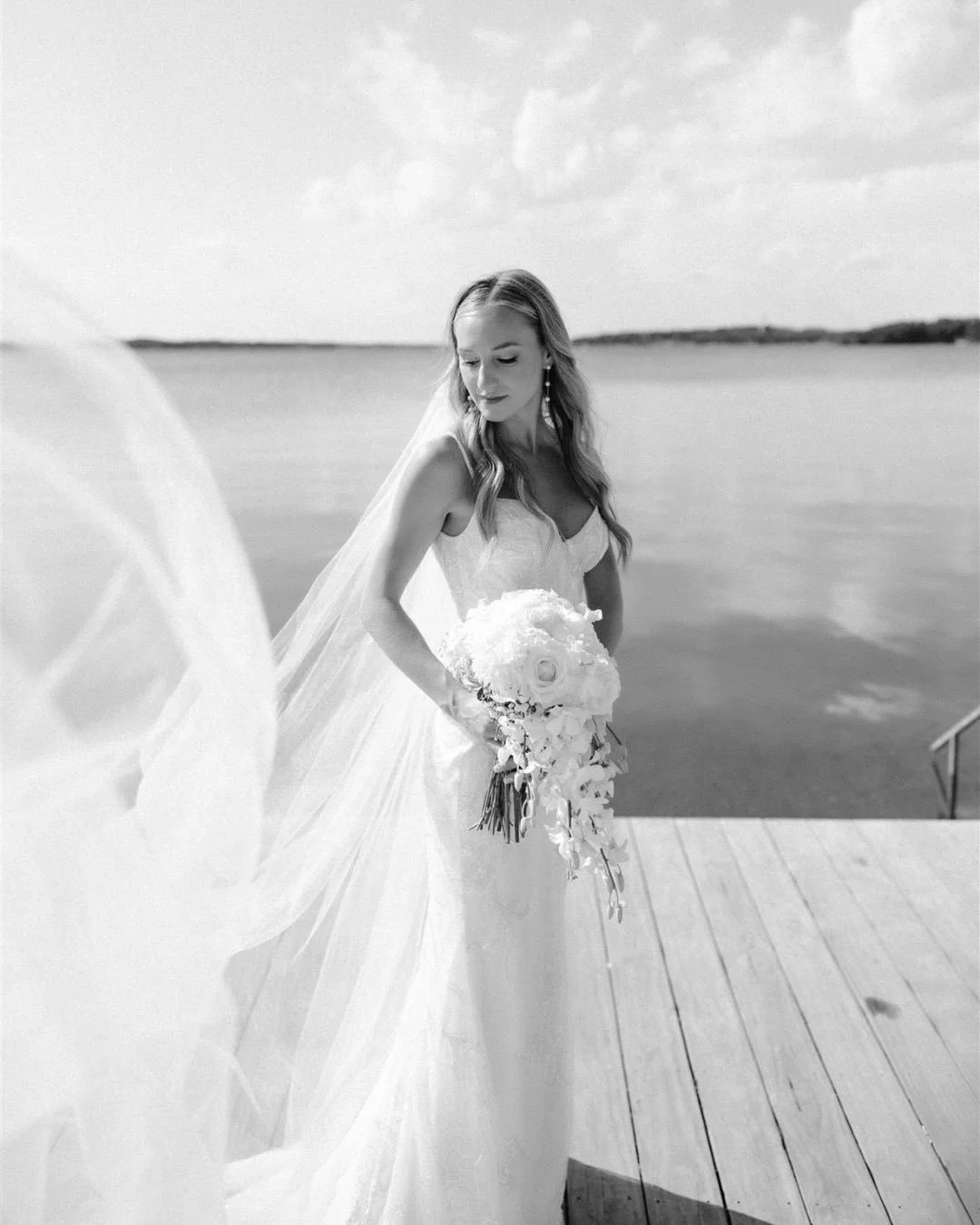 The wedding party understood the assignment 🤍

Classic black tuxes, soft champagne tones, lake views, and a couple that looked like they stepped straight out of a movie. Every photo somehow feels effortless and iconic at the same time. 

Also&hellip