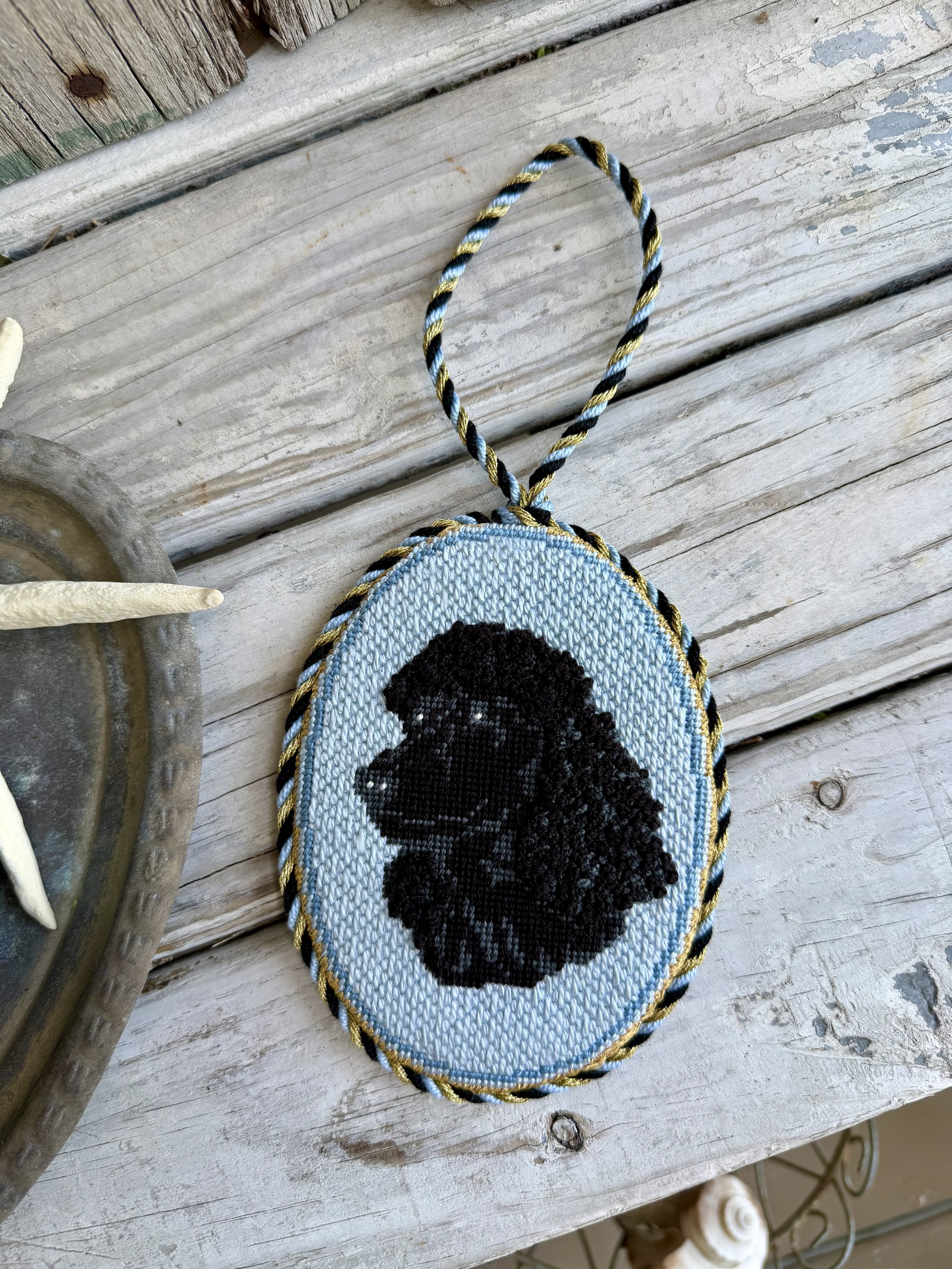 Oval Needlepoint Ornament with custom cording  - Finished by The Salty Stitchery