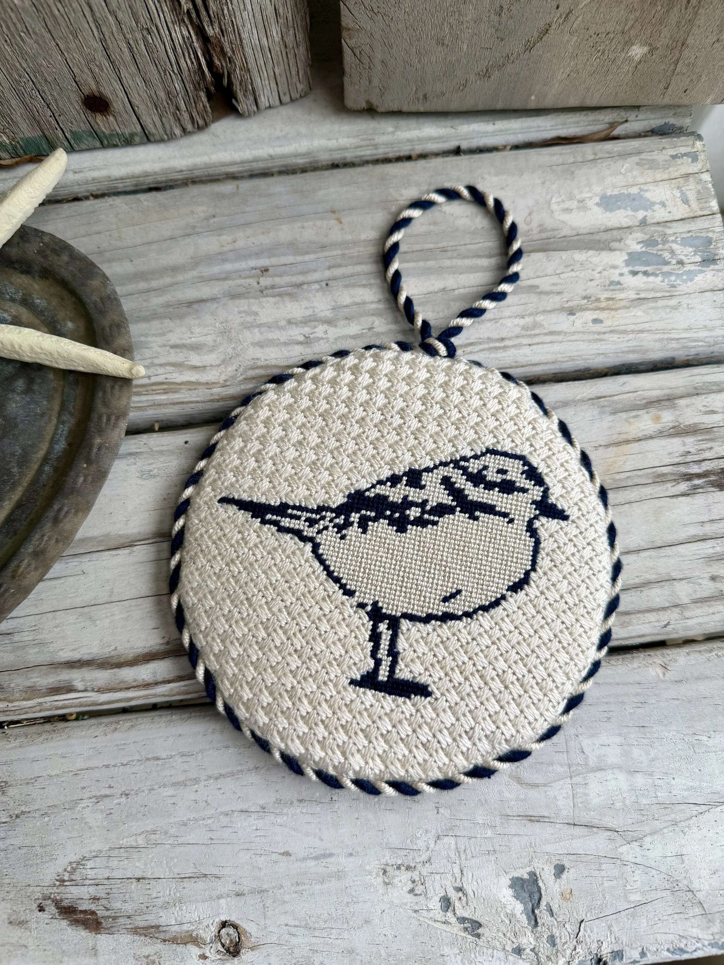  Large Round Finished Needlepoint Ornament with custom cording. Pointed Positivity Logo hand stitched Finished with The Salty Stitchery
