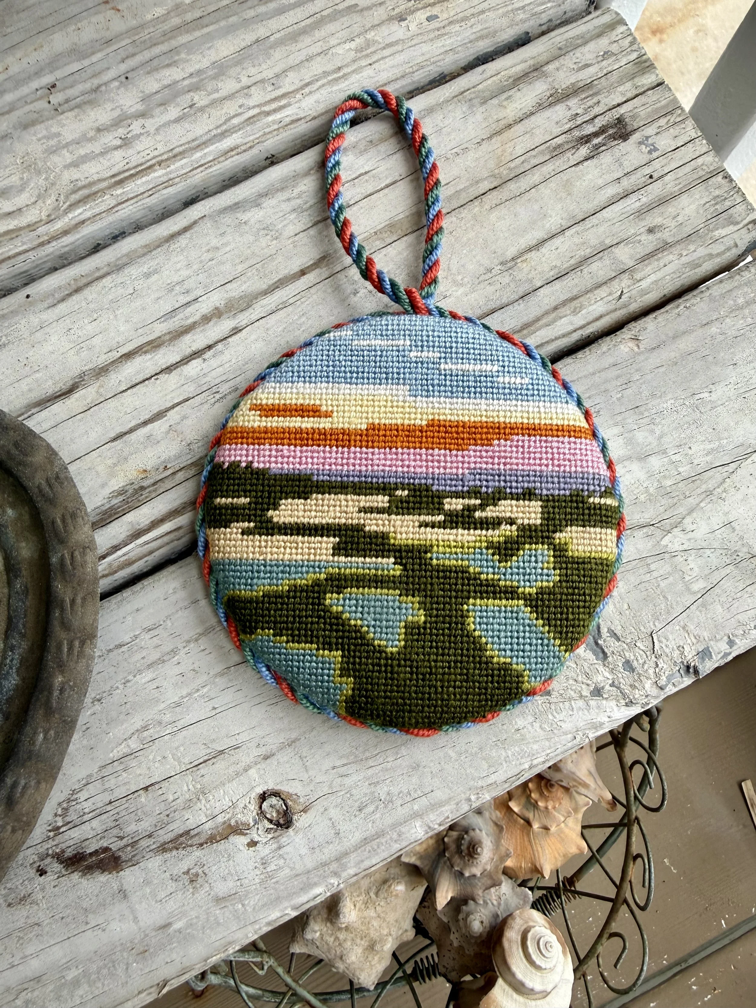  Round Finished Needlepoint Ornaments with custom cording. Coastal Marsh Sunset image hand stitched Finished with The Salty Stitchery