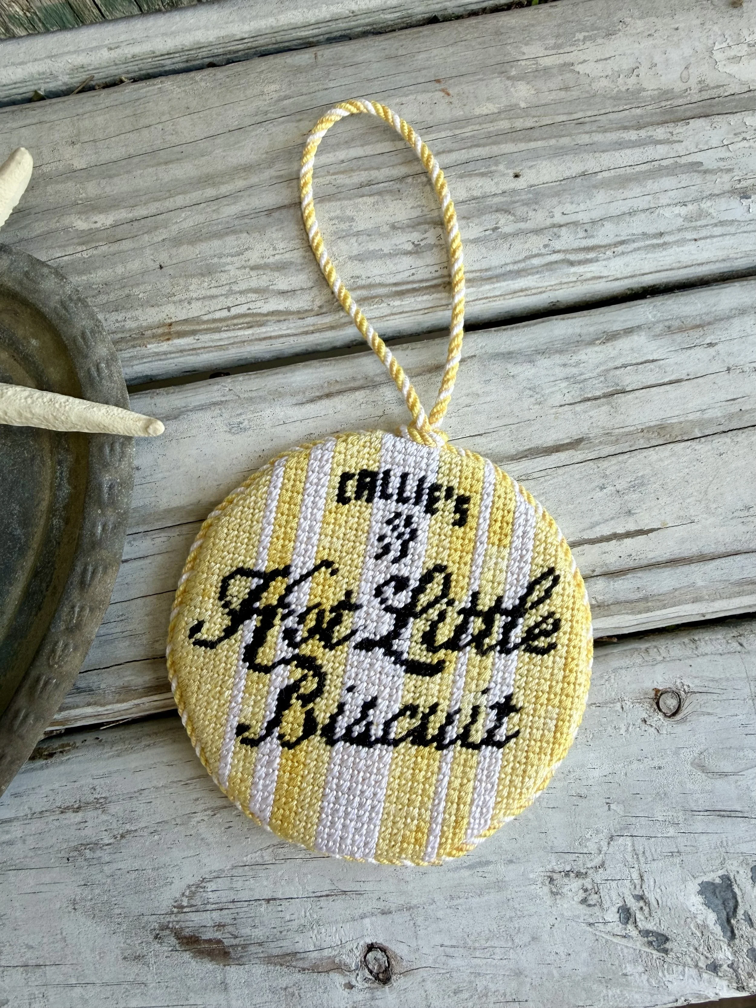 Round Needlepoint Ornament with custom cording  - Finished by The Salty Stitchery