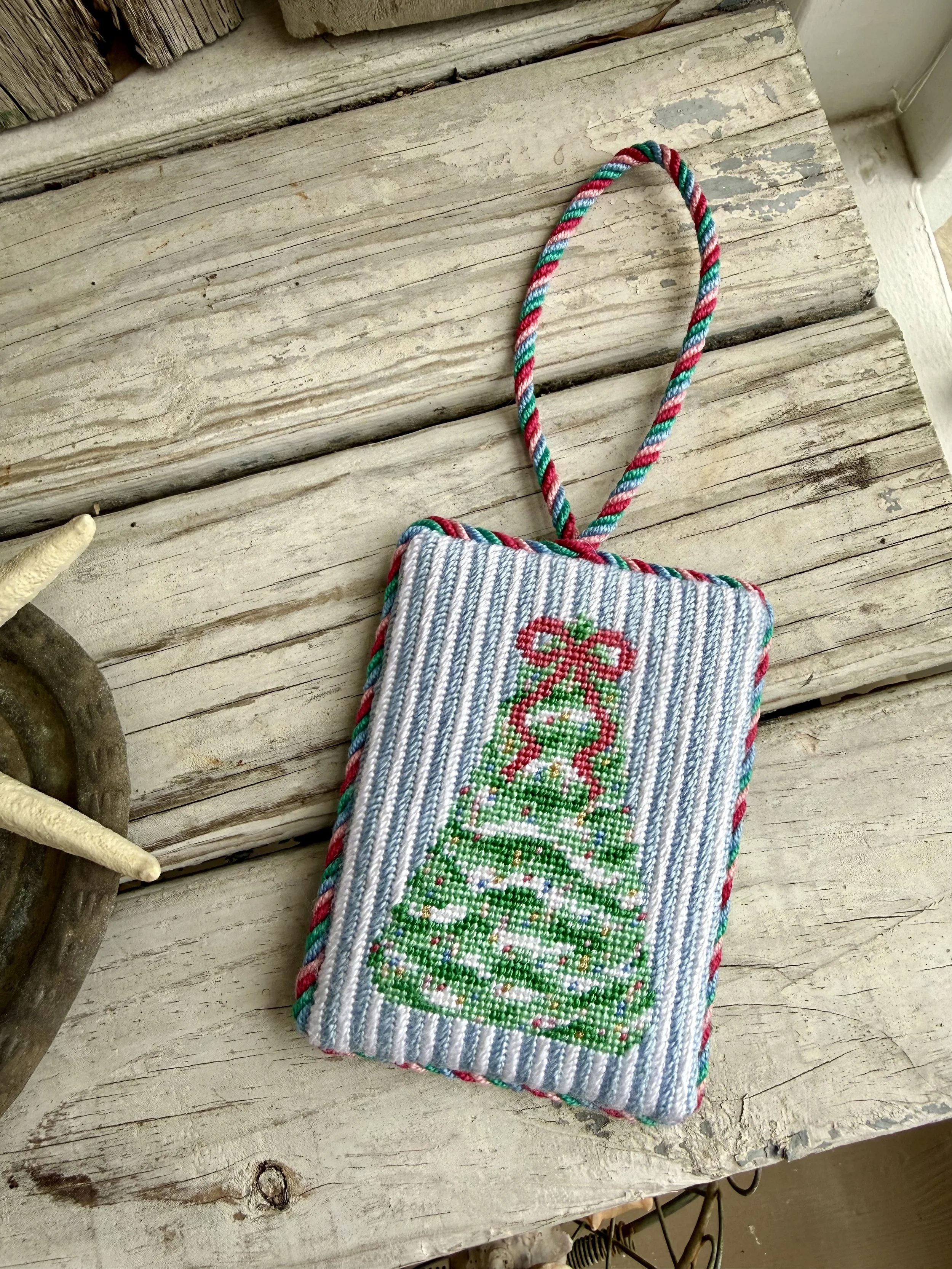 Square Finished Needlepoint Ornaments with custom cording. Pastel Christmas tree image hand stitched Finished with The Salty Stitchery