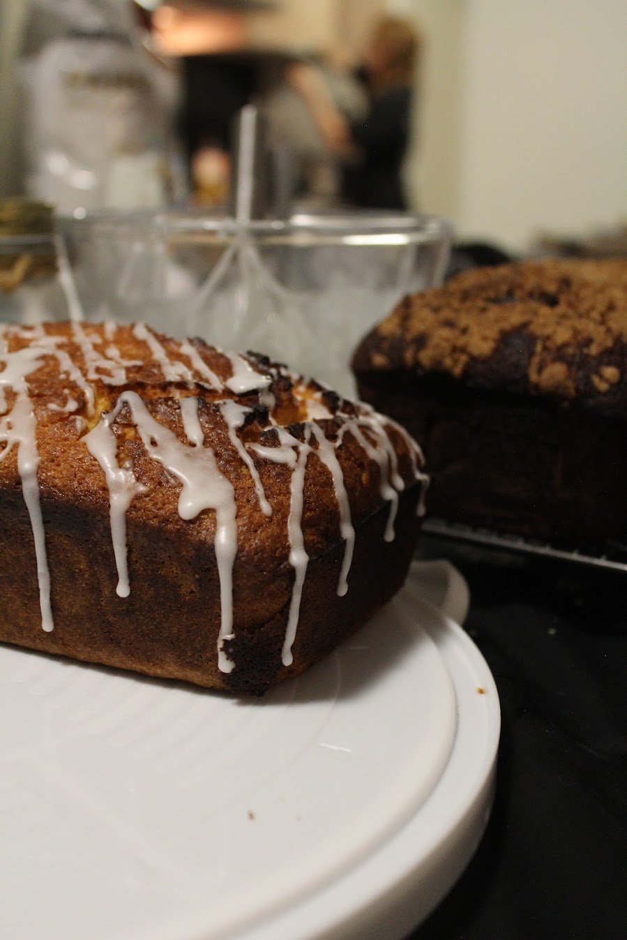 Lactose-free lime and coconut loaf cake with a white icing drizzle
