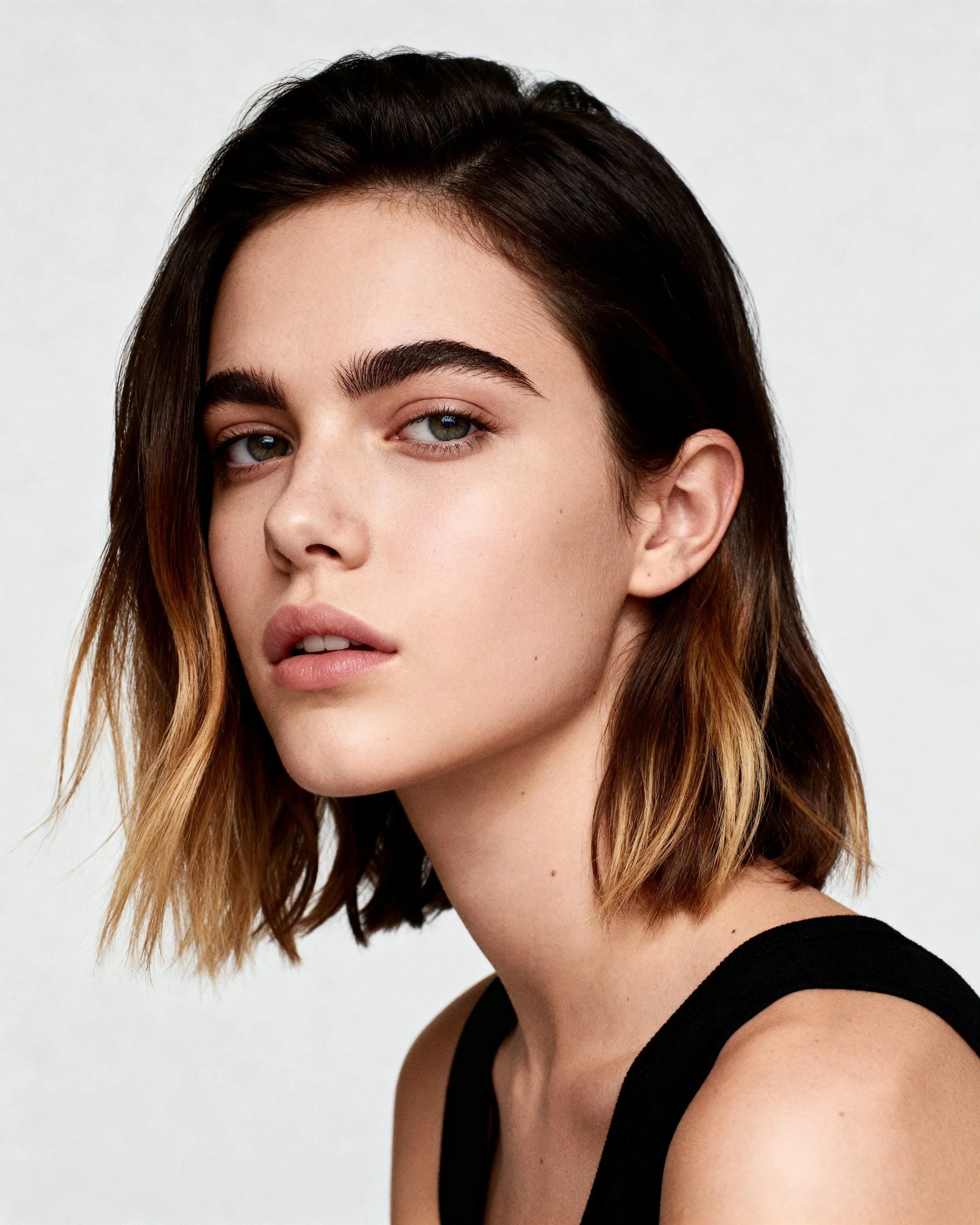 seedream-4.0_Editorial_beauty_portrait_of_a_young_woman_with_a_3_4_face_view_showcasing_soft_-2.jpg