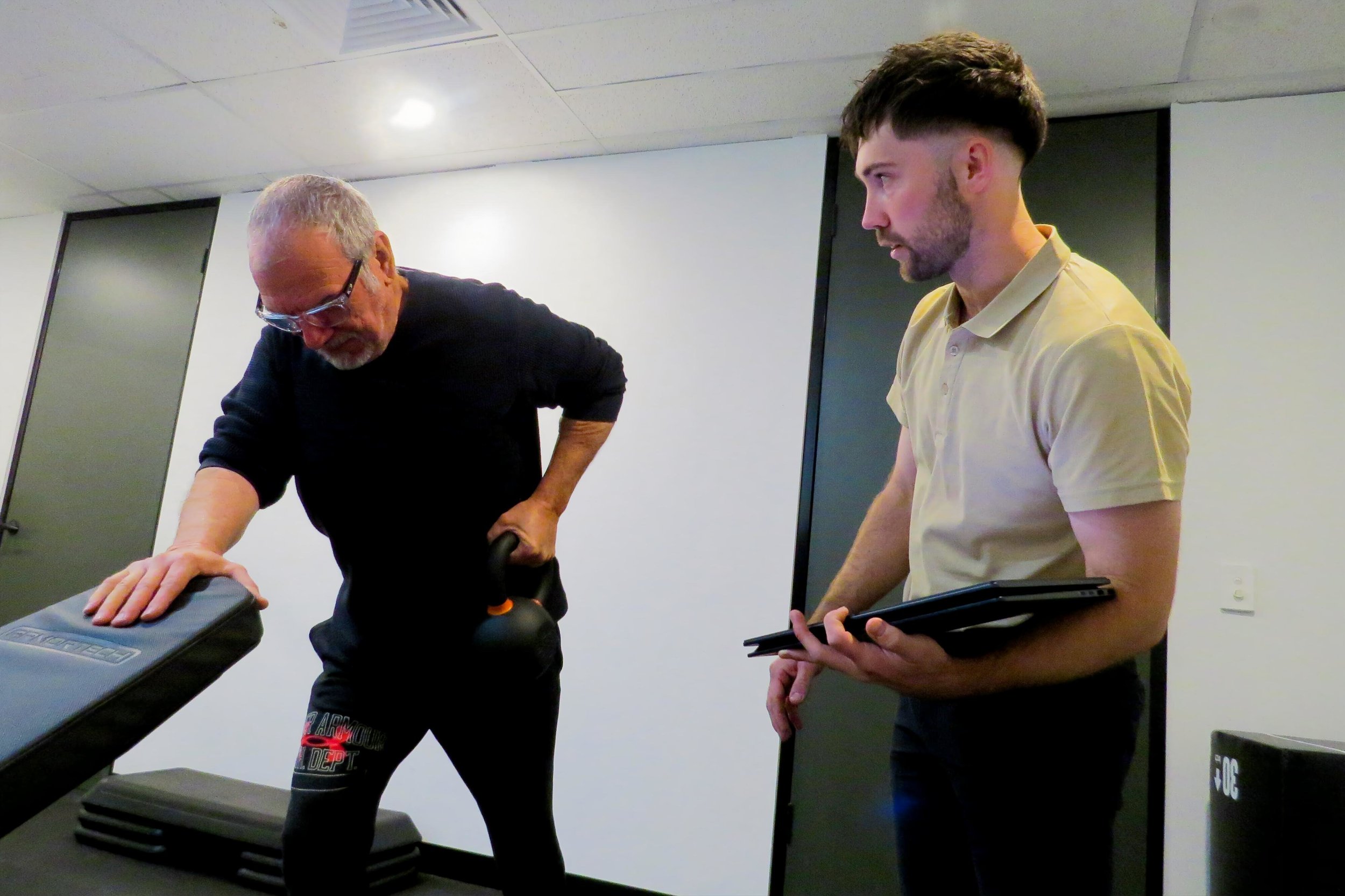 Exercise Physiologist reviewing a DVA patient to help them with their condition