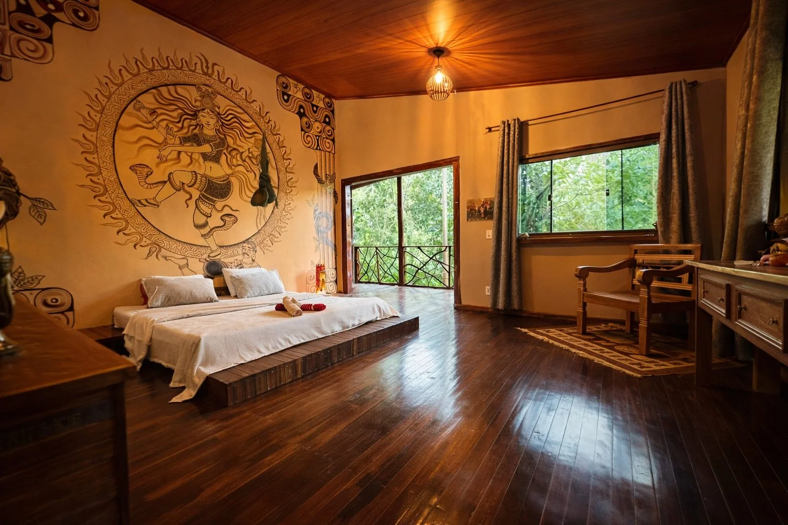 Spacious bedroom with natural materials and mountain view at Iboga retreat center Brazil