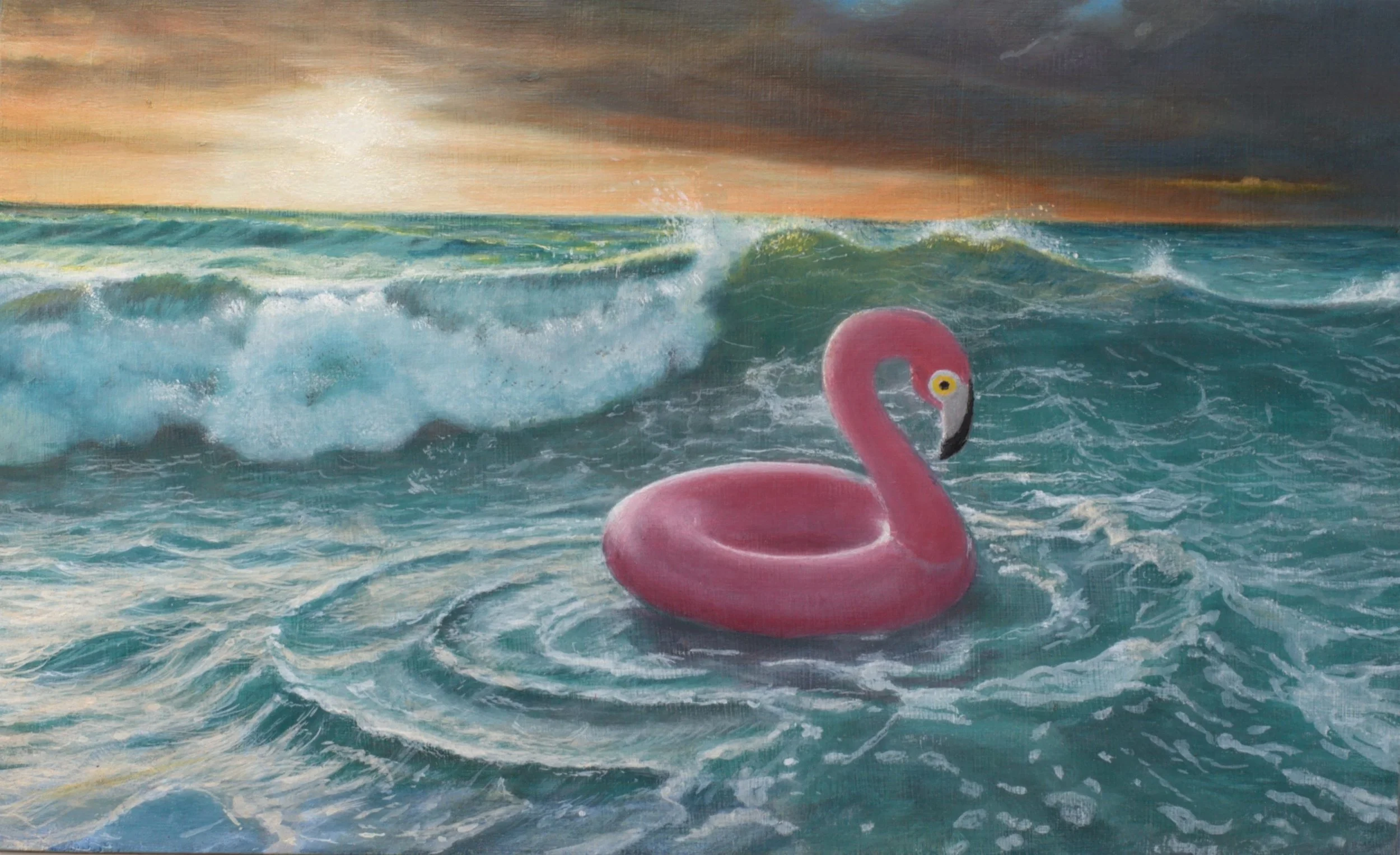 A pink flamingo pool float on the ocean with waves and a sunset or sunrise sky in the background.