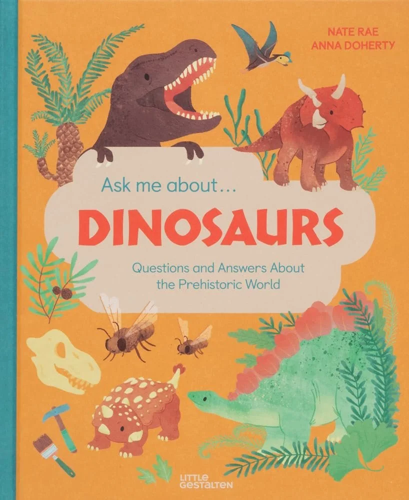Colorful children's book cover titled "Ask me about... DINOSAURS" by Nate Rae and Anna Doherty. Features illustrations of a T-Rex, Triceratops, a flying pterosaur, and a small dinosaur, with plants, bees, and a skull illustration in the background.