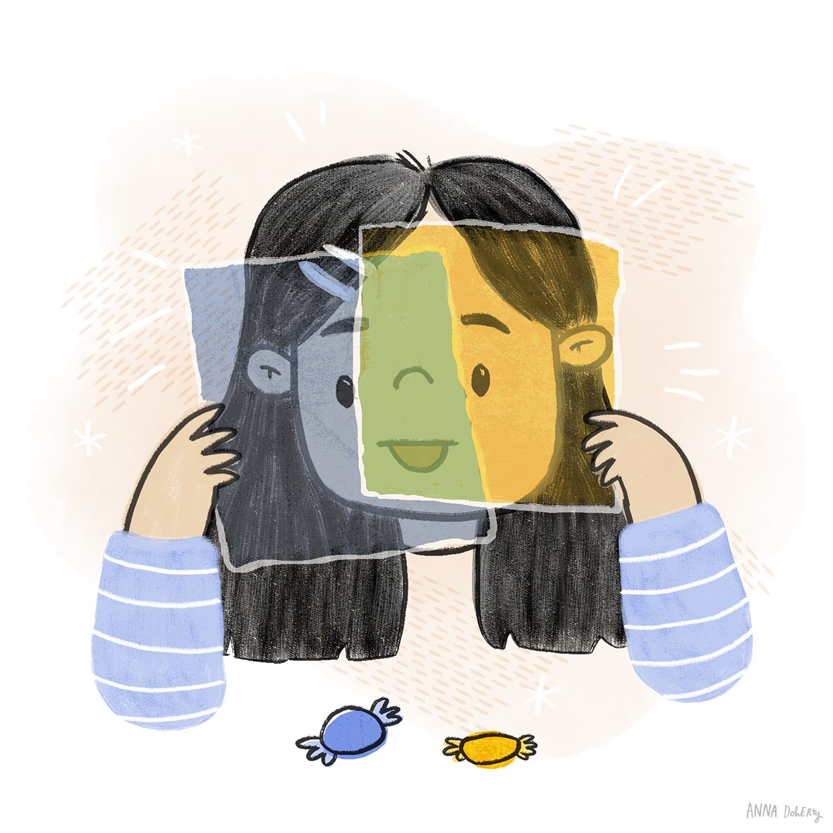 Person holding a colorful face mask with a smiling face, which covers part of her face, with candies on the table.