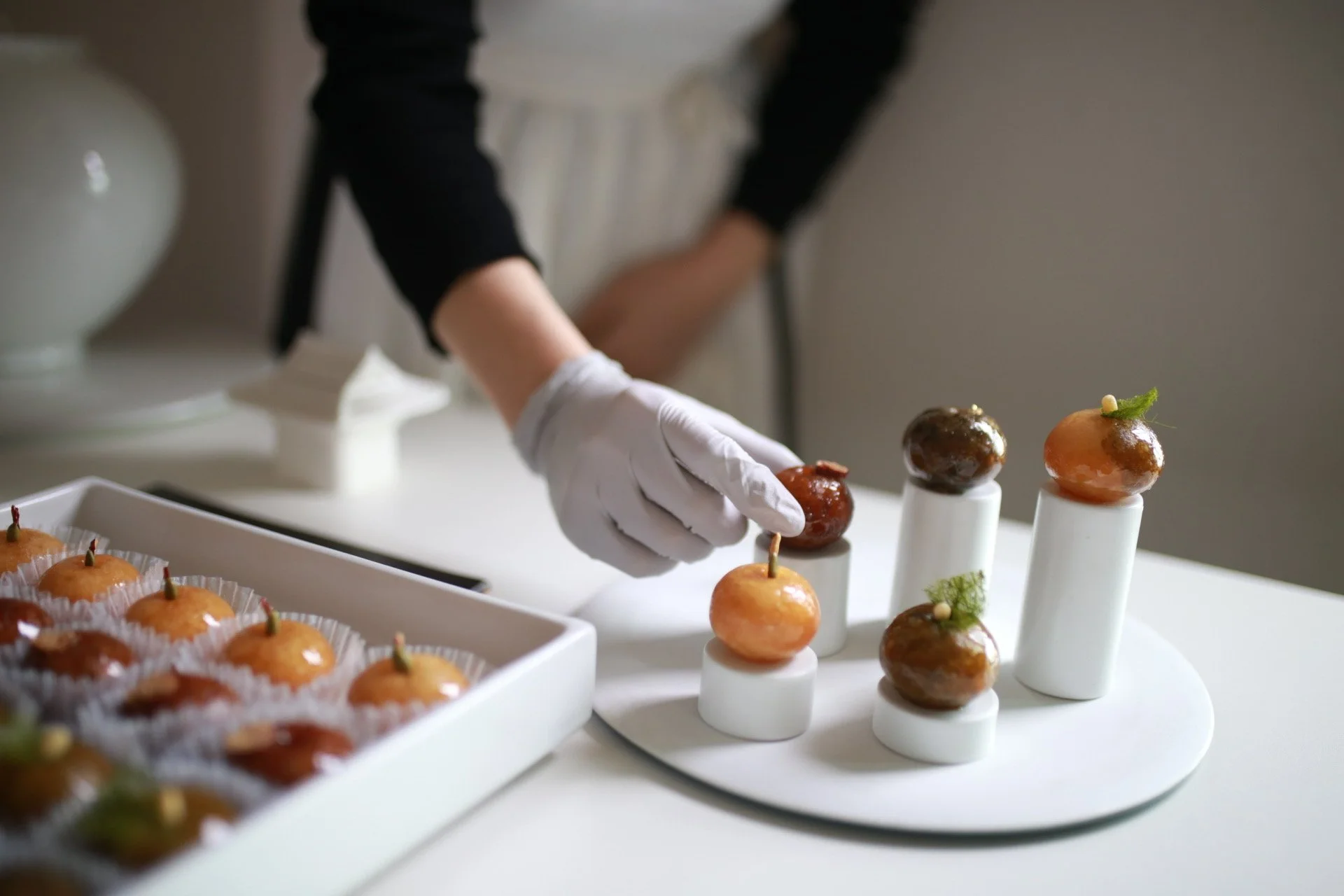 Korean traditional desserts plated in minimalist fine dining style