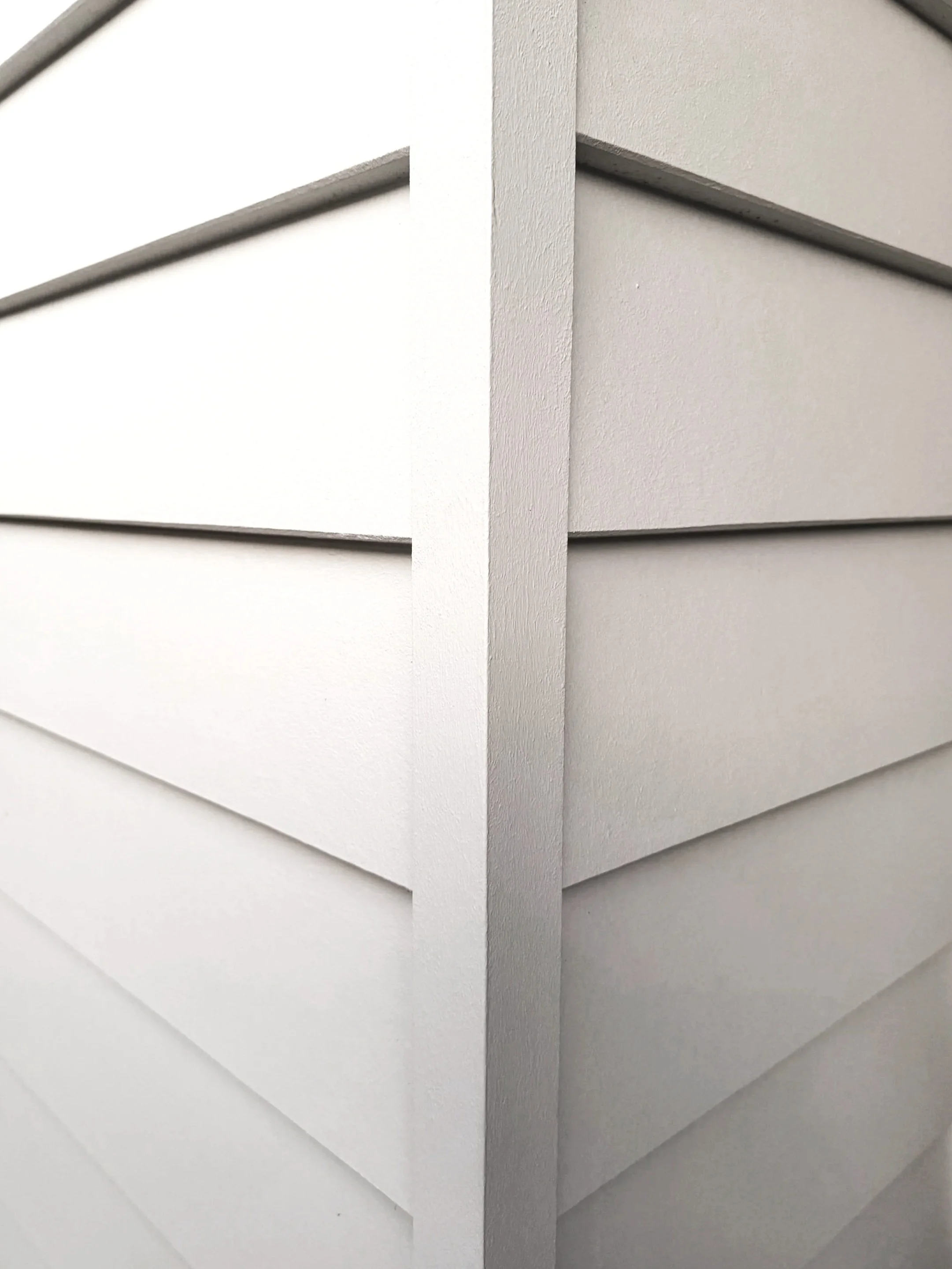 Close-up of white horizontal cladding corner detail