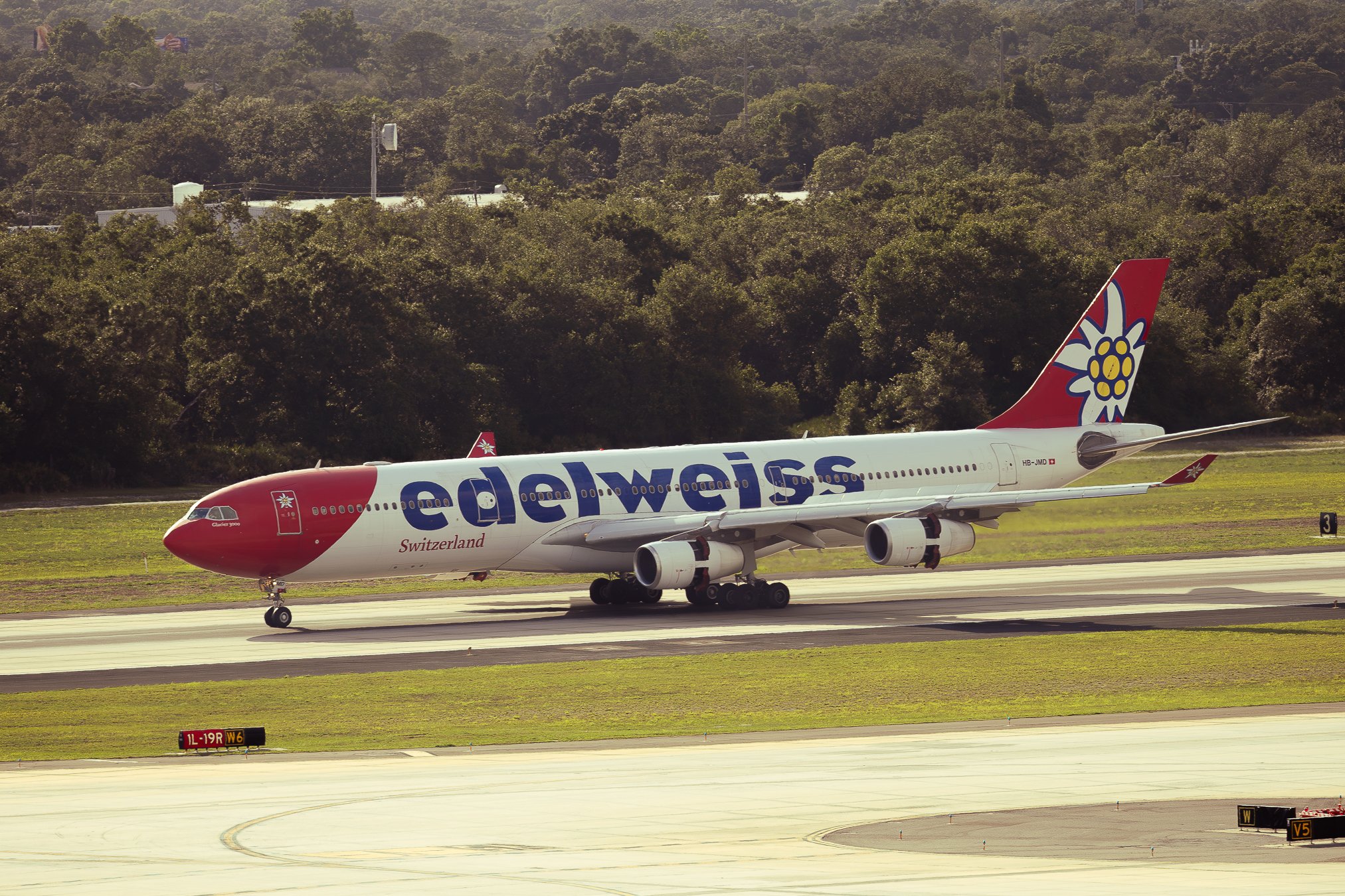 Edelweiss Airbus A340-300 arriving on runway 18R from Zürich, Switzerland