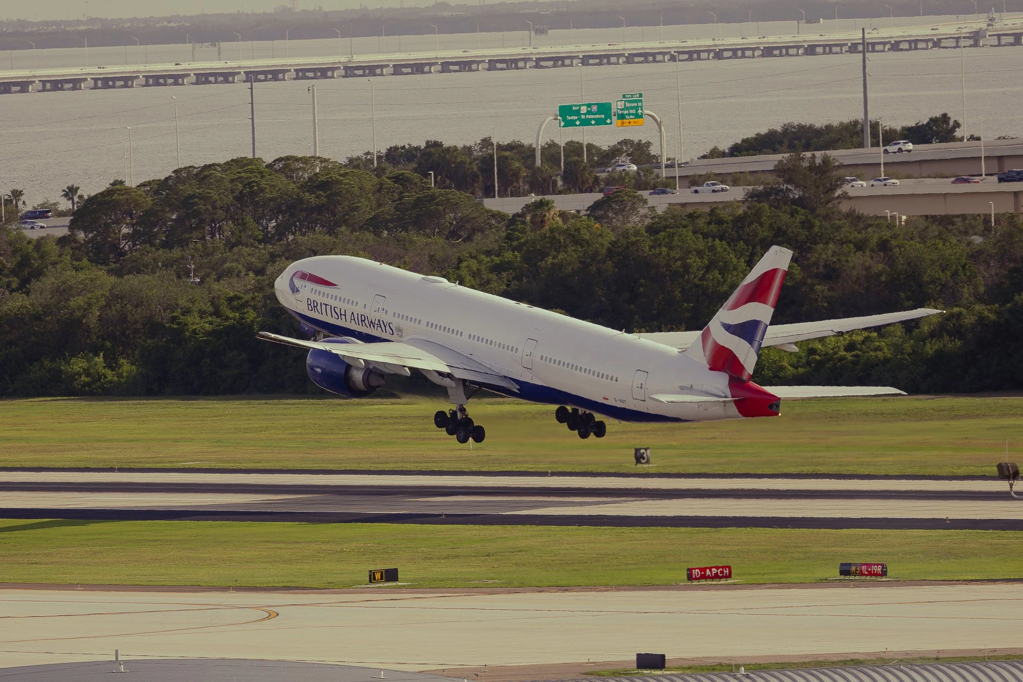 British Airways Boeing 777-200ER departing runway 18R at KTPA en-route to London Gatwick 