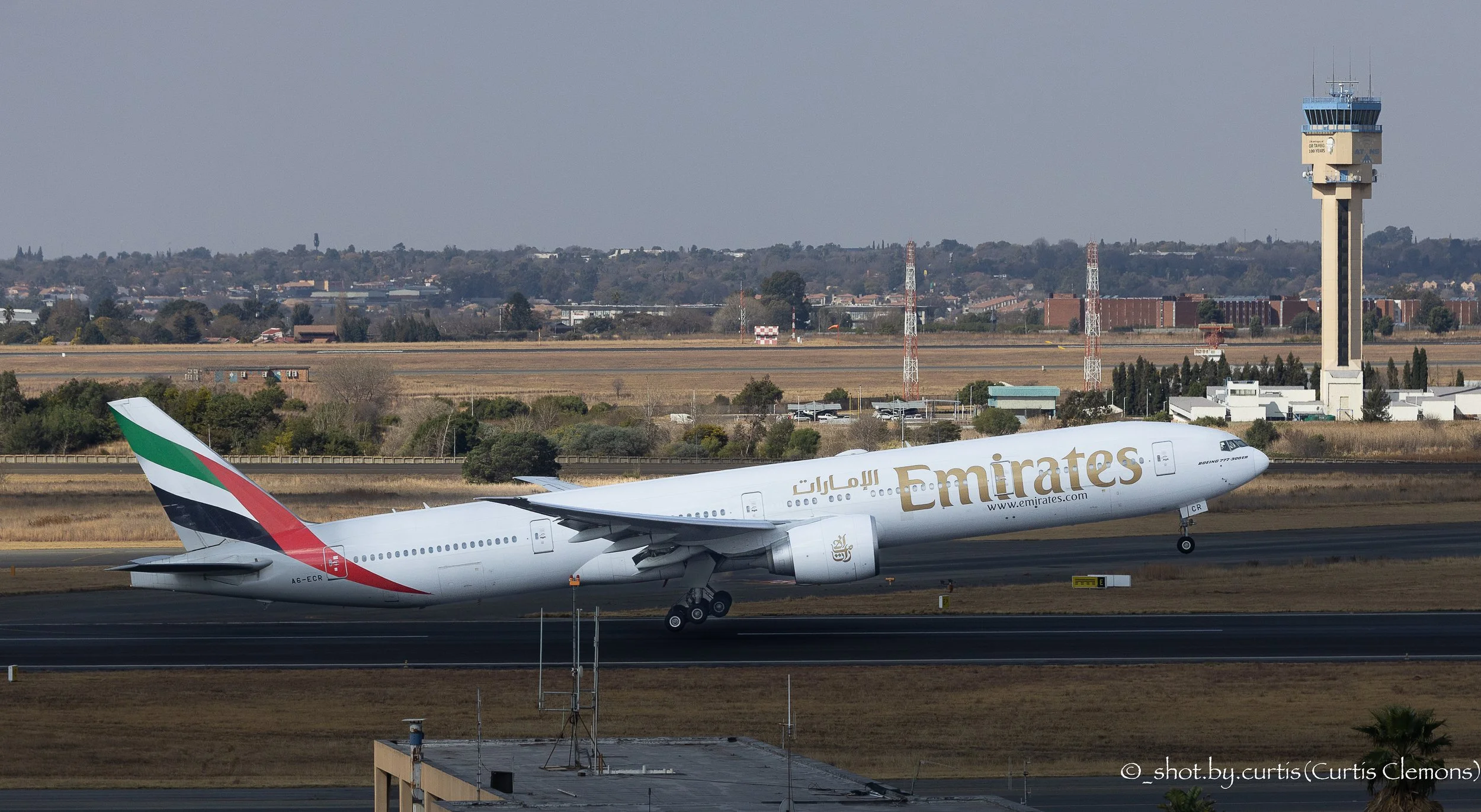 Emirates Boeing 777-300ER departing from O.R Tambo International Airport in Johannesburg, South Africa en-route to Dubai, UAE