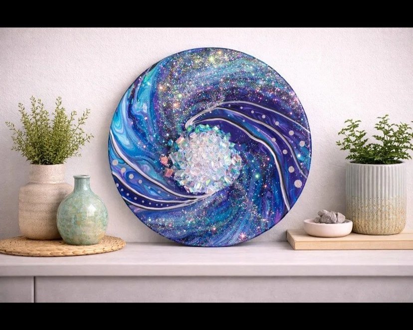Celestial Vortex

This is a 12 inch canvas with acrylic paint, fire glass, glitter and resin. 