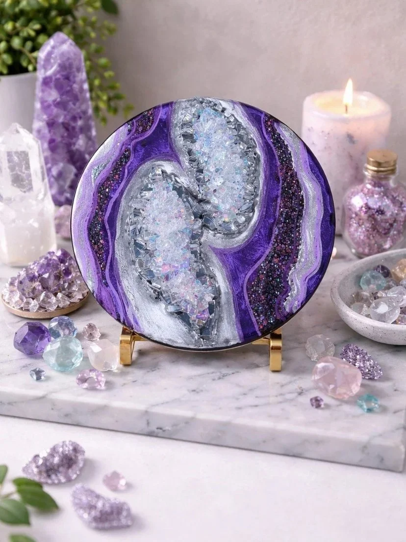 Amethyst tide

This is a 6 inch wood round with acrylic paint, pigment, fire glass, resin and marker. 