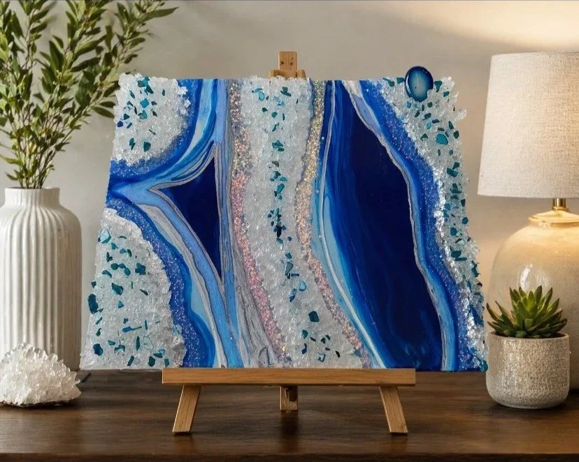 Loyal blues

This is a 10 by 14 wood panel with resin, pigment fireglass and embellishments. 