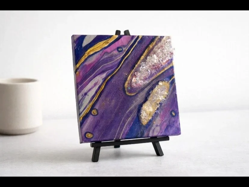 Meteor shower

This is a 6 by 6 inch canvas with paint, fireglass, glitter and resin. 