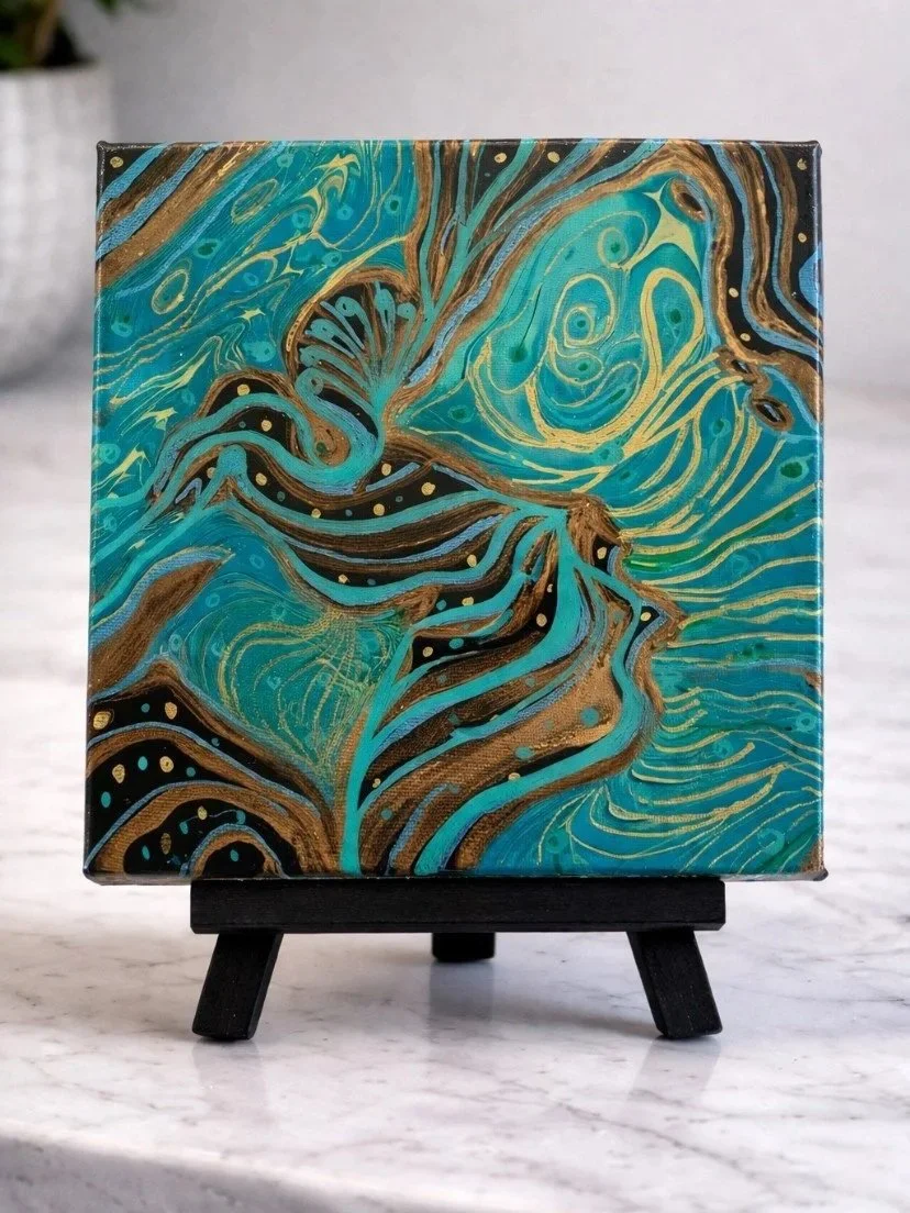 Metamorphosis

This is a 6 inch by 6 inch canvas with paint, markers and resin. 