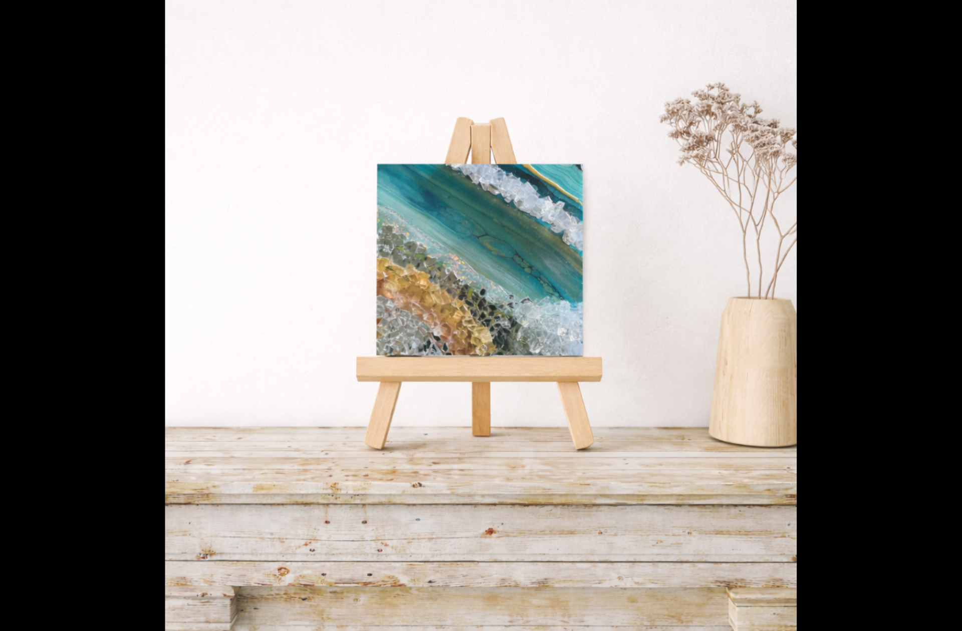 This is a 6 by 6 inch canvas with acrylic paint resin, fireglass and spray paint. 