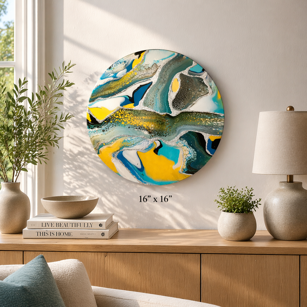 Geoflow

16 inch round canvas with acrylic and glitter covered in resin. 