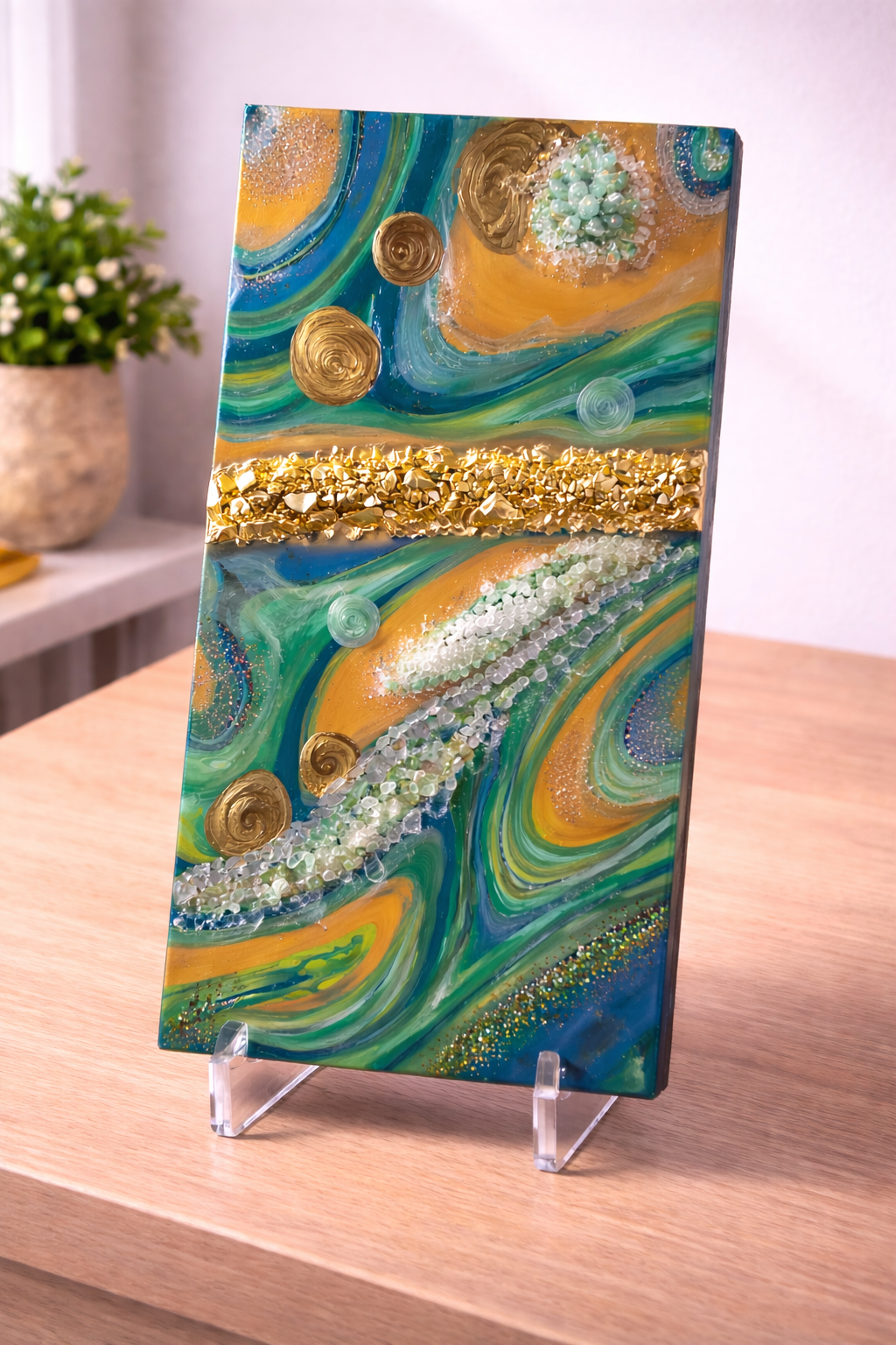 Gold rush

This is a 10 by 20 inch level 3 gallery wrapped canvas with paint, mica, pigments, fireglass, glitter, resin crystals and resin.  