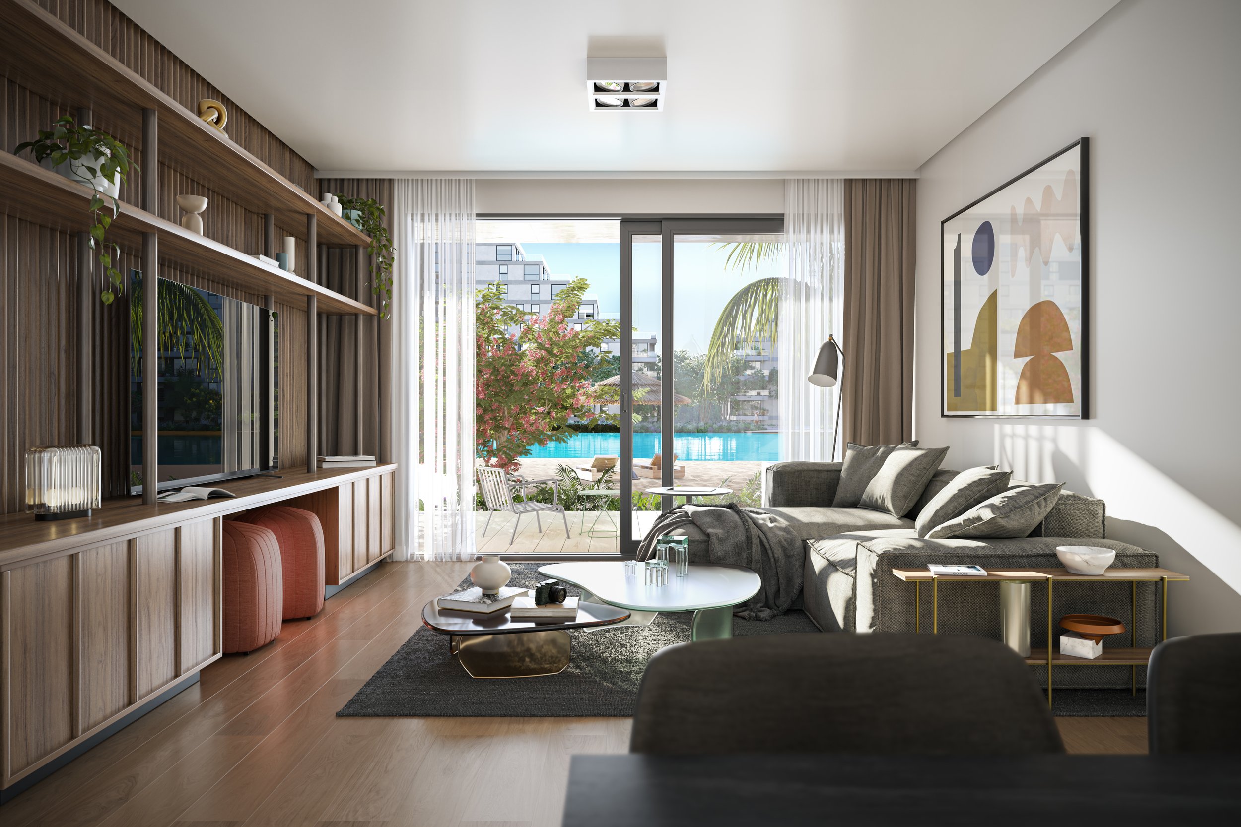 Living room with large sliding glass doors leading to a pool area, modern gray sectional sofa, abstract wall art, wooden shelving with plants and decor, and a view of outdoor furniture and palm trees.