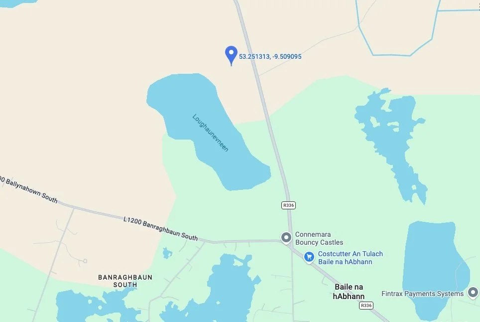 Map showing Lakes Loughauveen and other bodies of water near Banraghbaun South in Ireland, with roads and landmarks including Connemara Bouncy Castles and Fintrax Payments Systems.