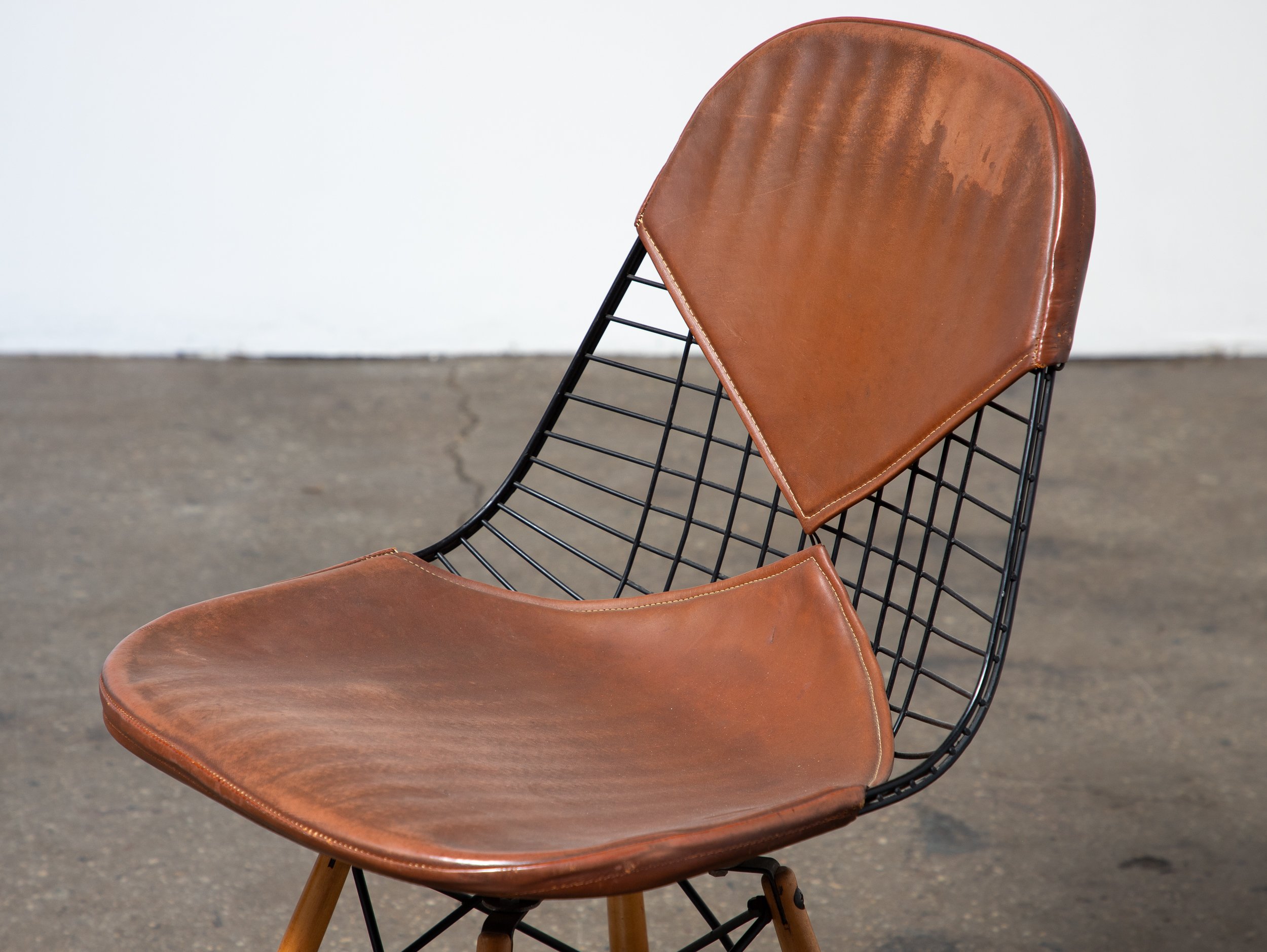 OAM_Swivel_Base_Maple_Base_Eames_Wire_With_Leather_Bikini_Cover-9.jpg