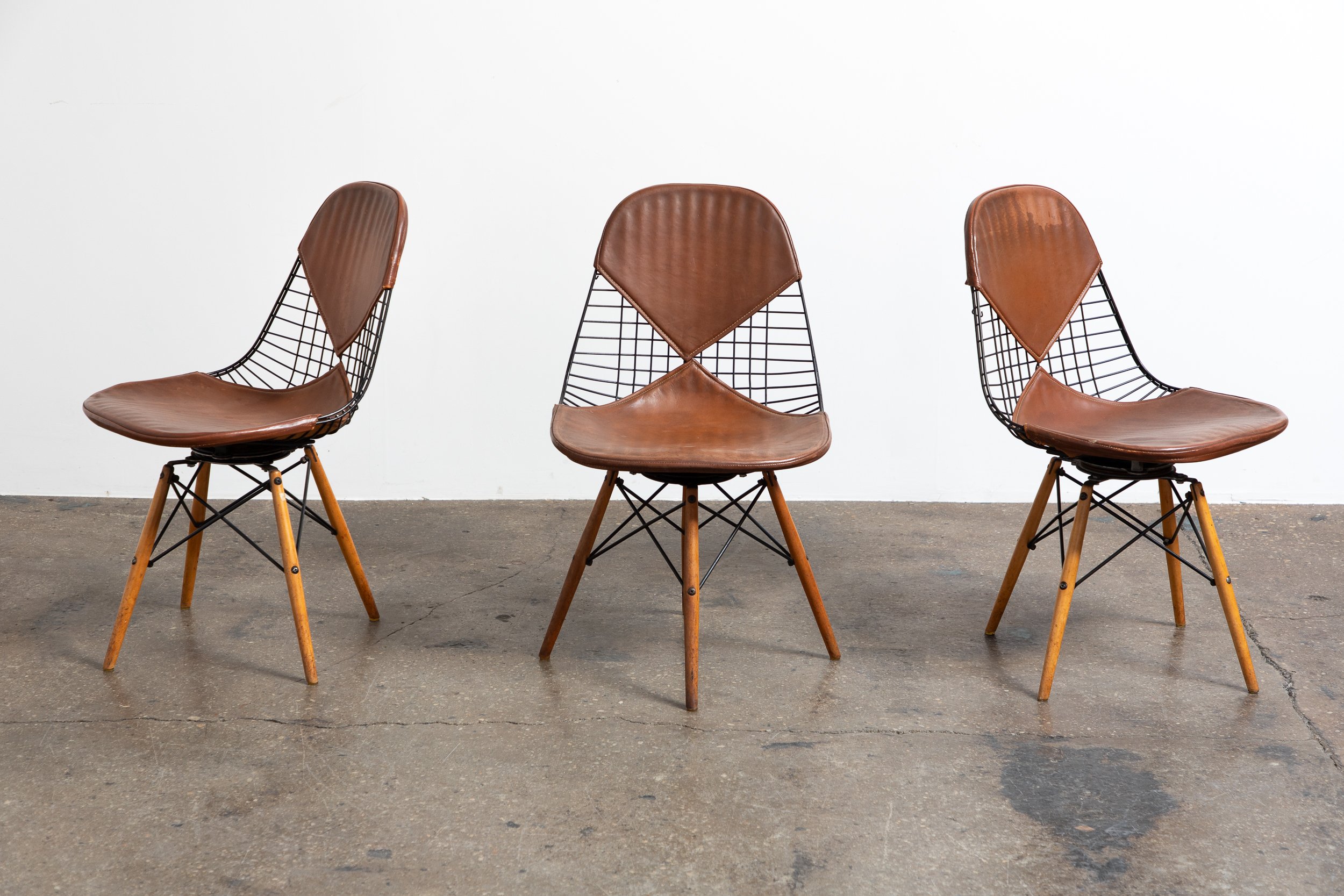 OAM_Swivel_Base_Maple_Base_Eames_Wire_With_Leather_Bikini_Cover-3.jpg