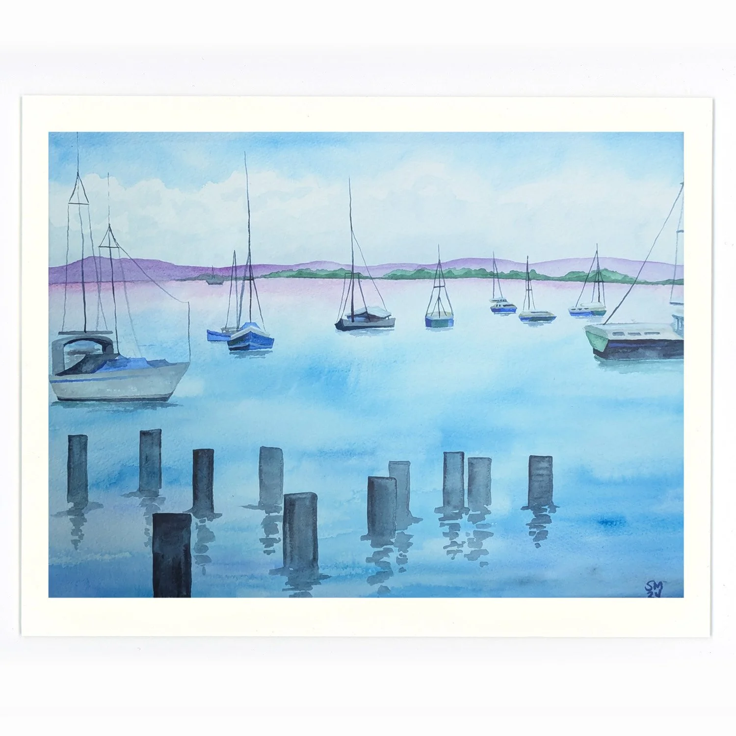 Watercolor painting of a harbor with boats docked on calm water, purple hills in the background, blue sky with clouds, and wooden posts in the foreground.