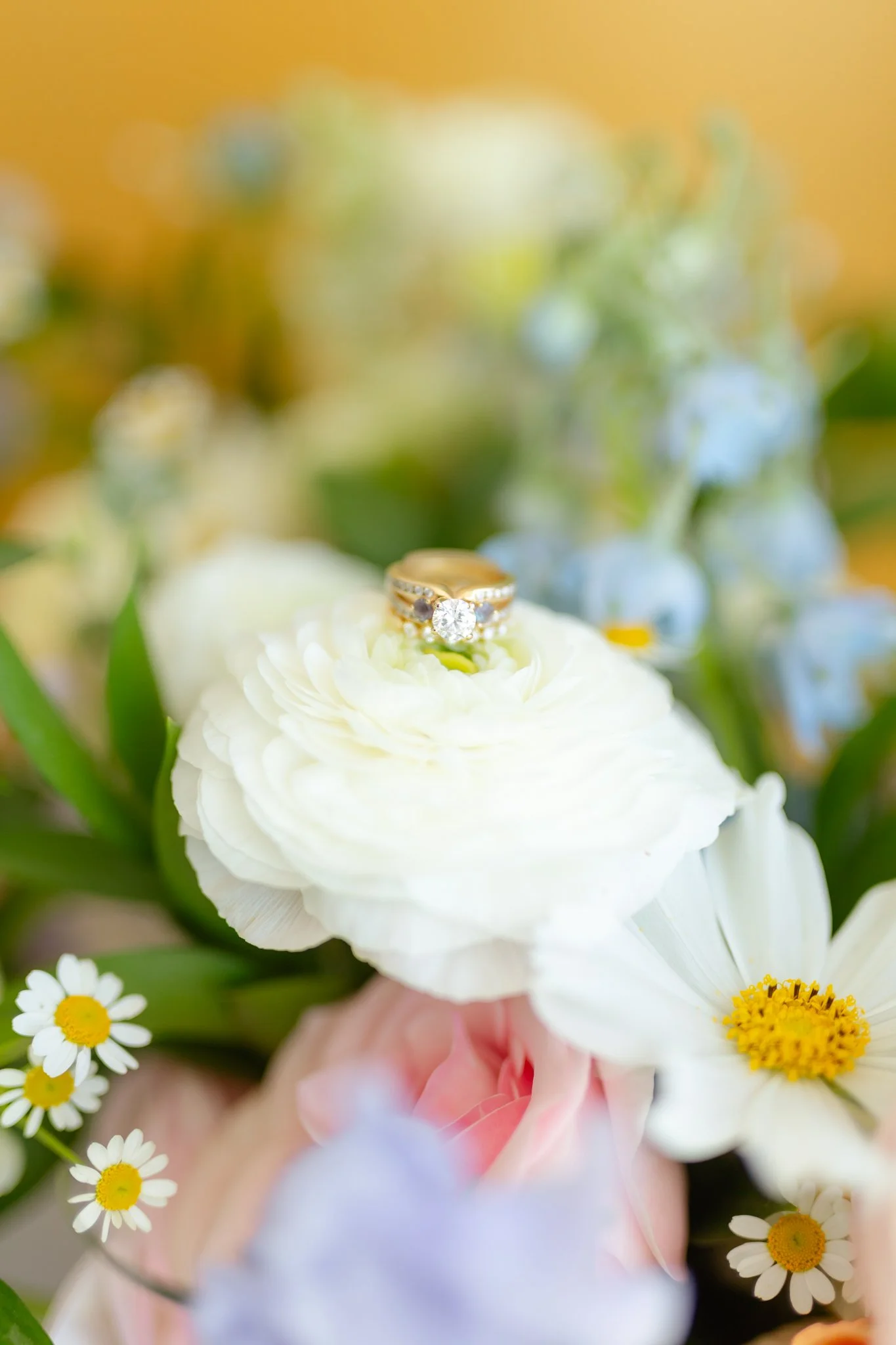 Engagement ring on wedding flowers. 