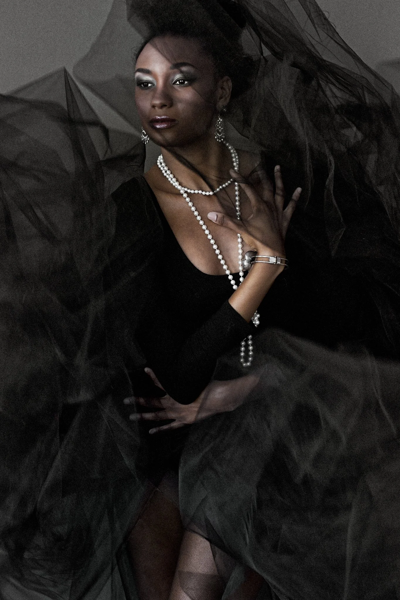 Artistic fine art portrait flowing tulle fabric