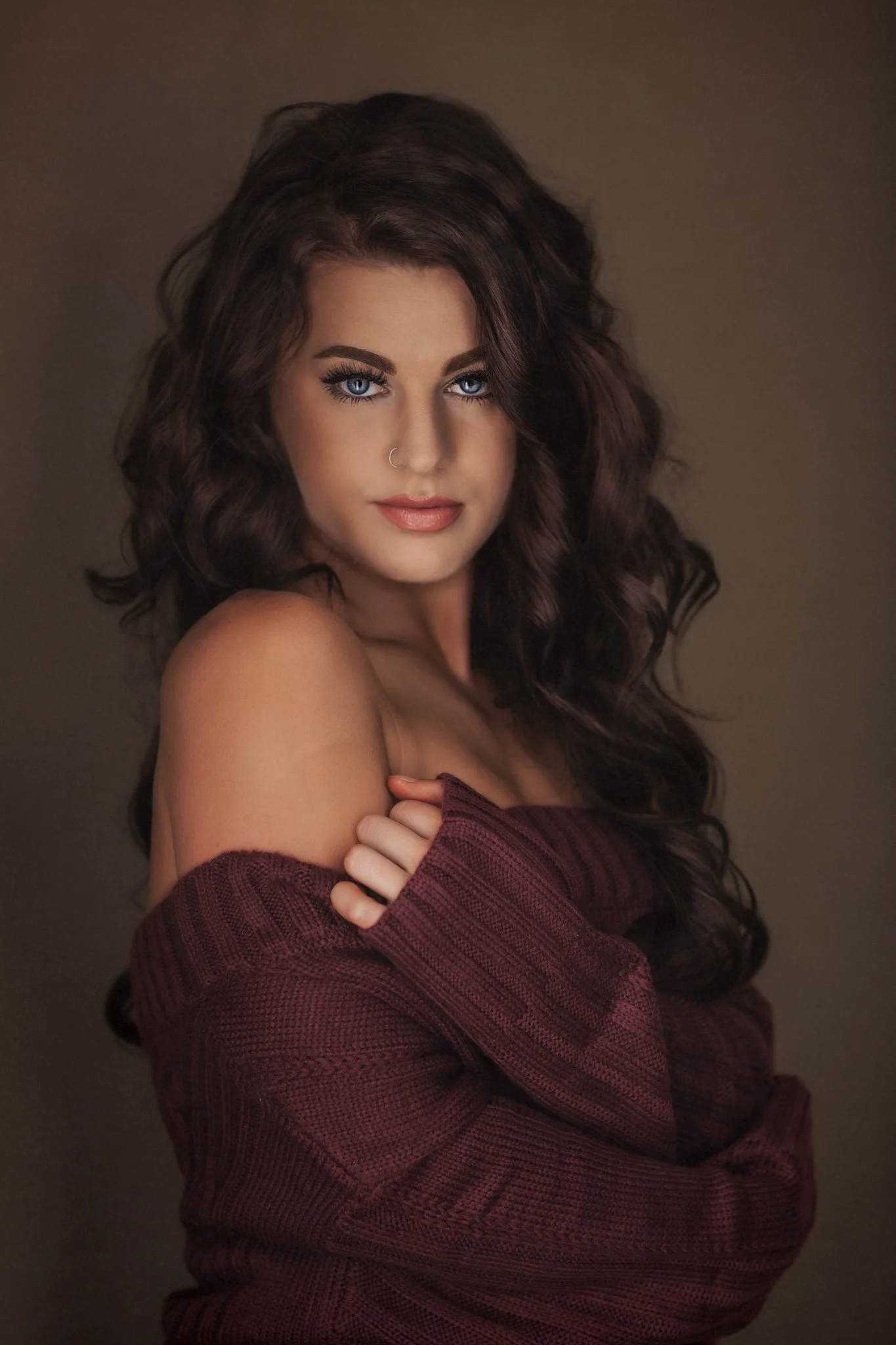 Fine art portrait of woman in burgundy sweater, Denver portrait photographer