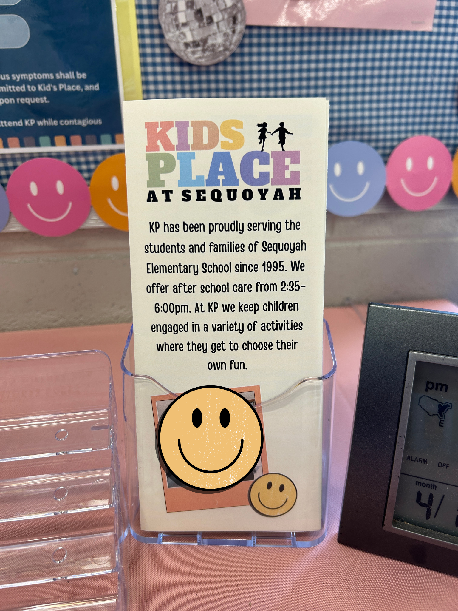 The logo is on a pamphlet about Kids Place that parents can take