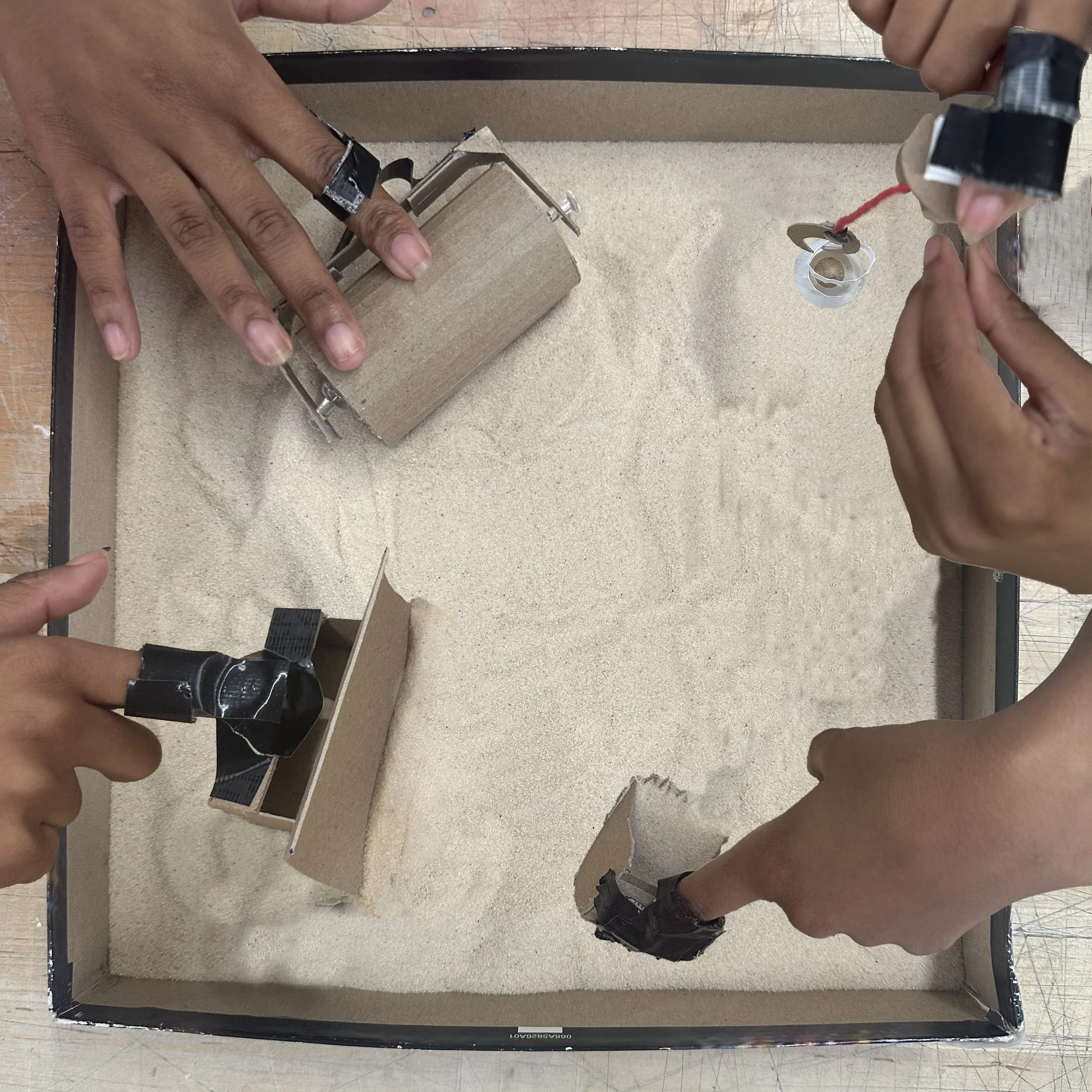 hands in sand (object play).jpg