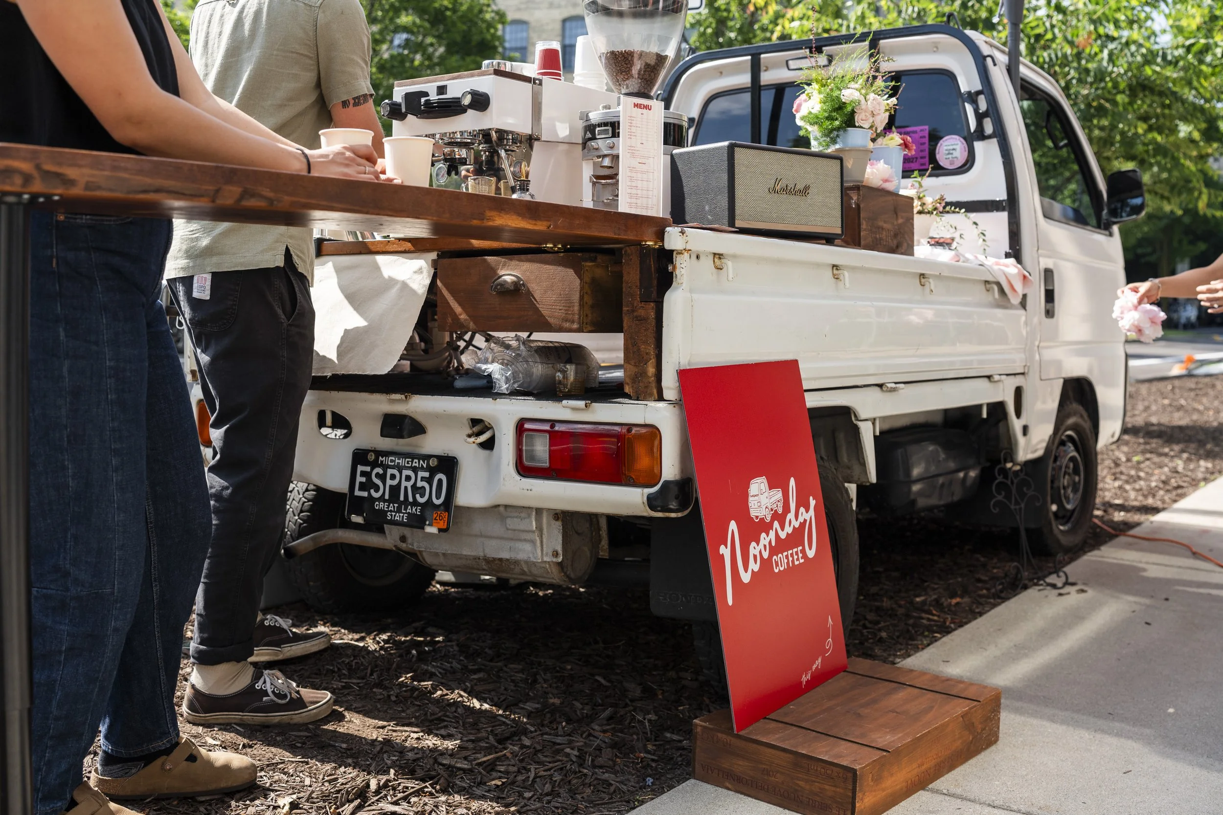 Coffee Truck with baristas serving espresso drinks, lattes & cappuccinos