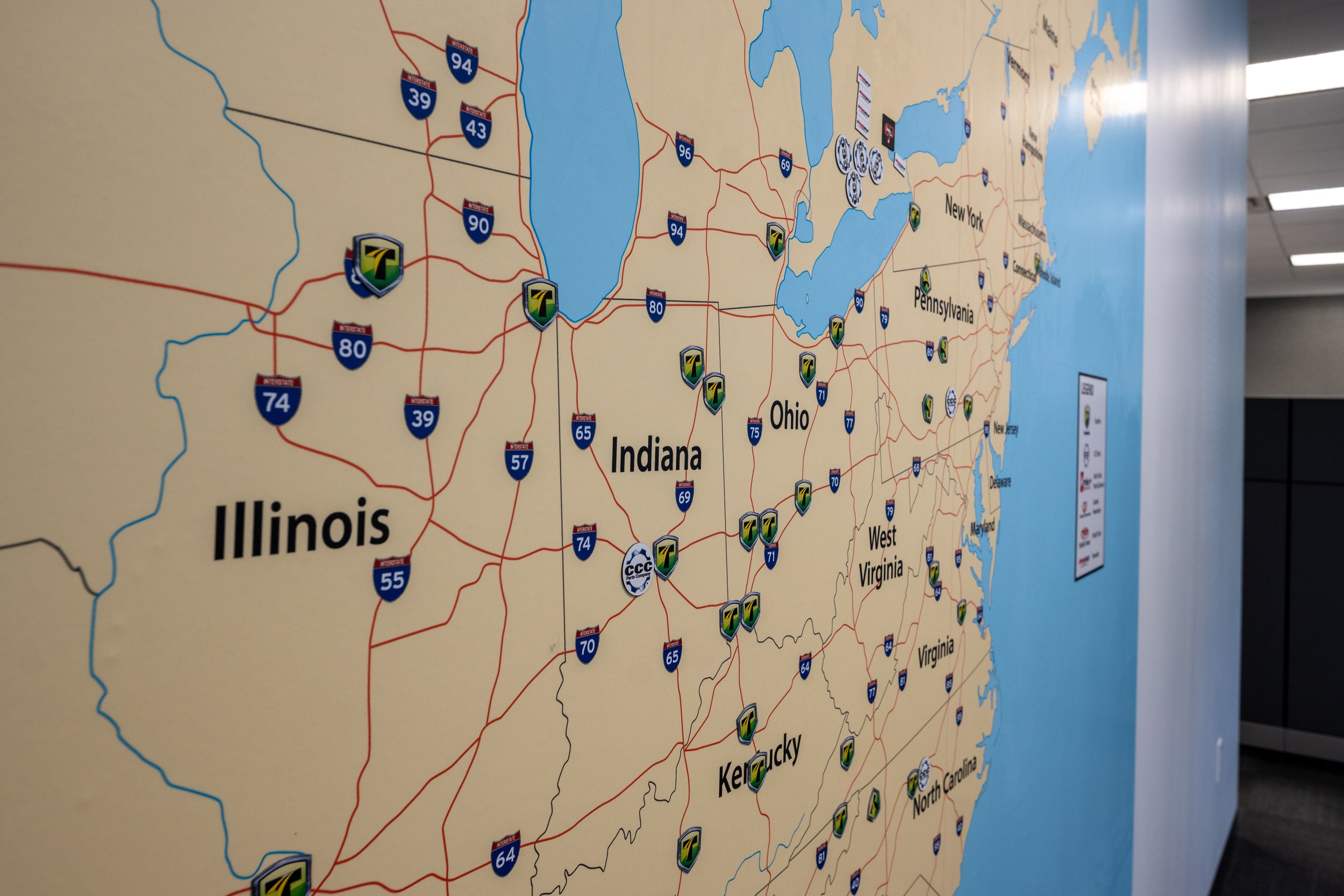 A map of the United States showing major highways and interstate routes with company logos of gas stations along the routes, including 7-Eleven and CEC.