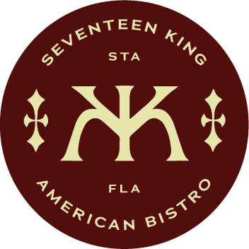A circular logo for Seventeen King American Bistro with Greek letters, decorative symbols, and the states of Florida and Georgia.