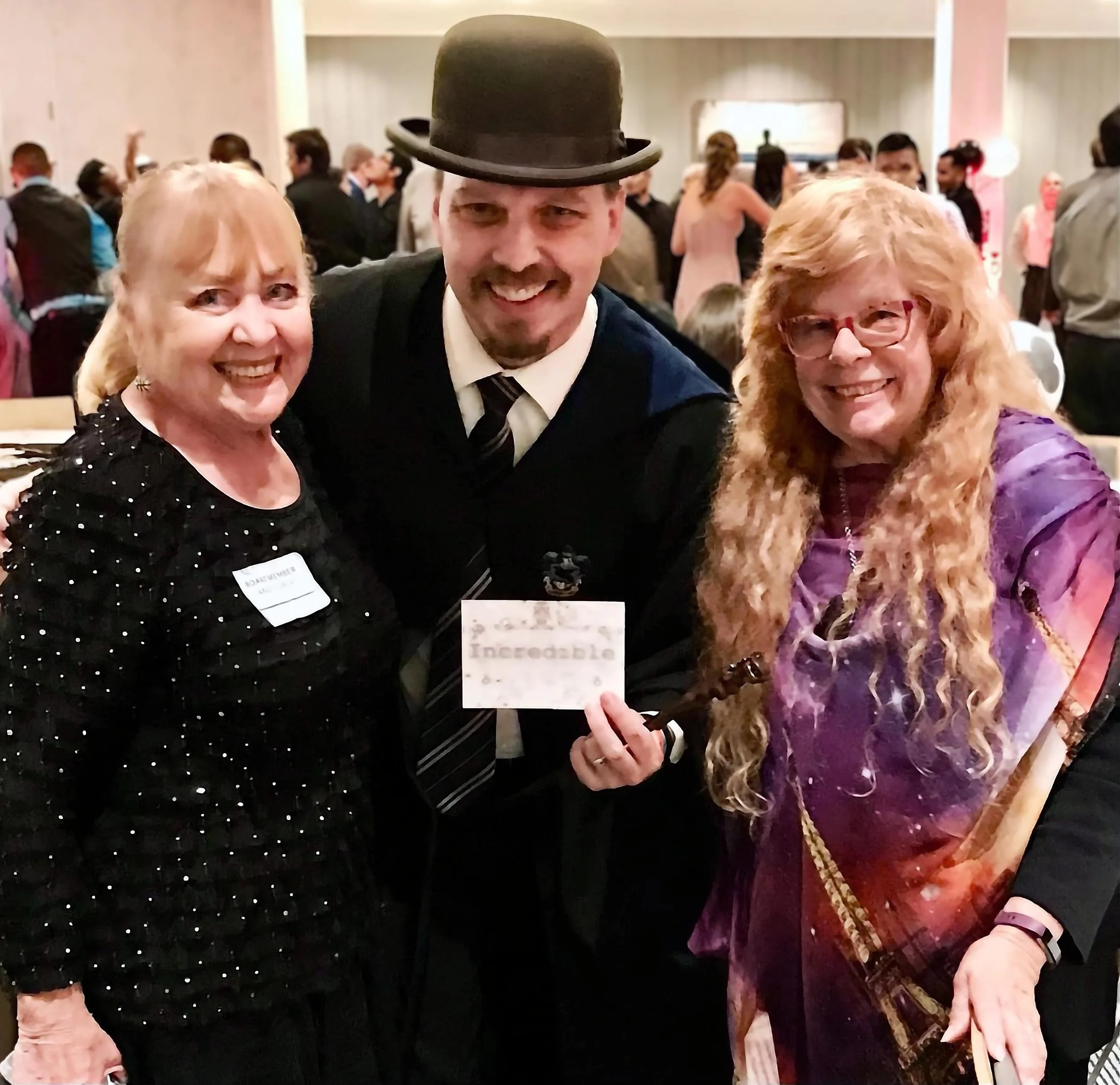 John at a Prom Event showing his Incredible card.