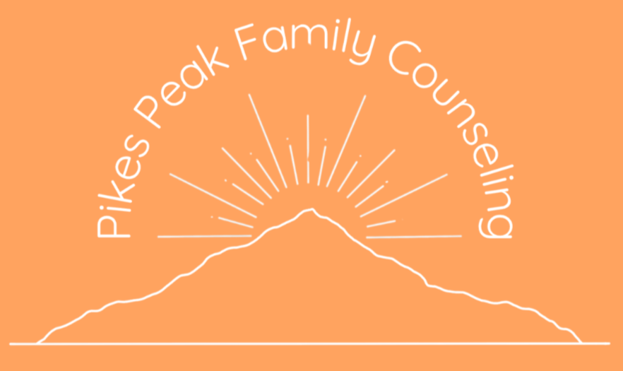 Logo for Pikes Peak Family Counseling with stylized mountain and rays of sunlight on an orange background.