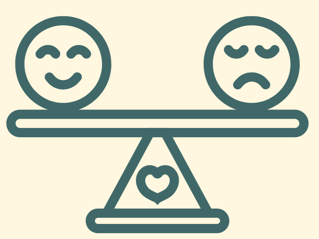 Seesaw with two smiley faces, one happy and one sad, and a heart in the center of the base
